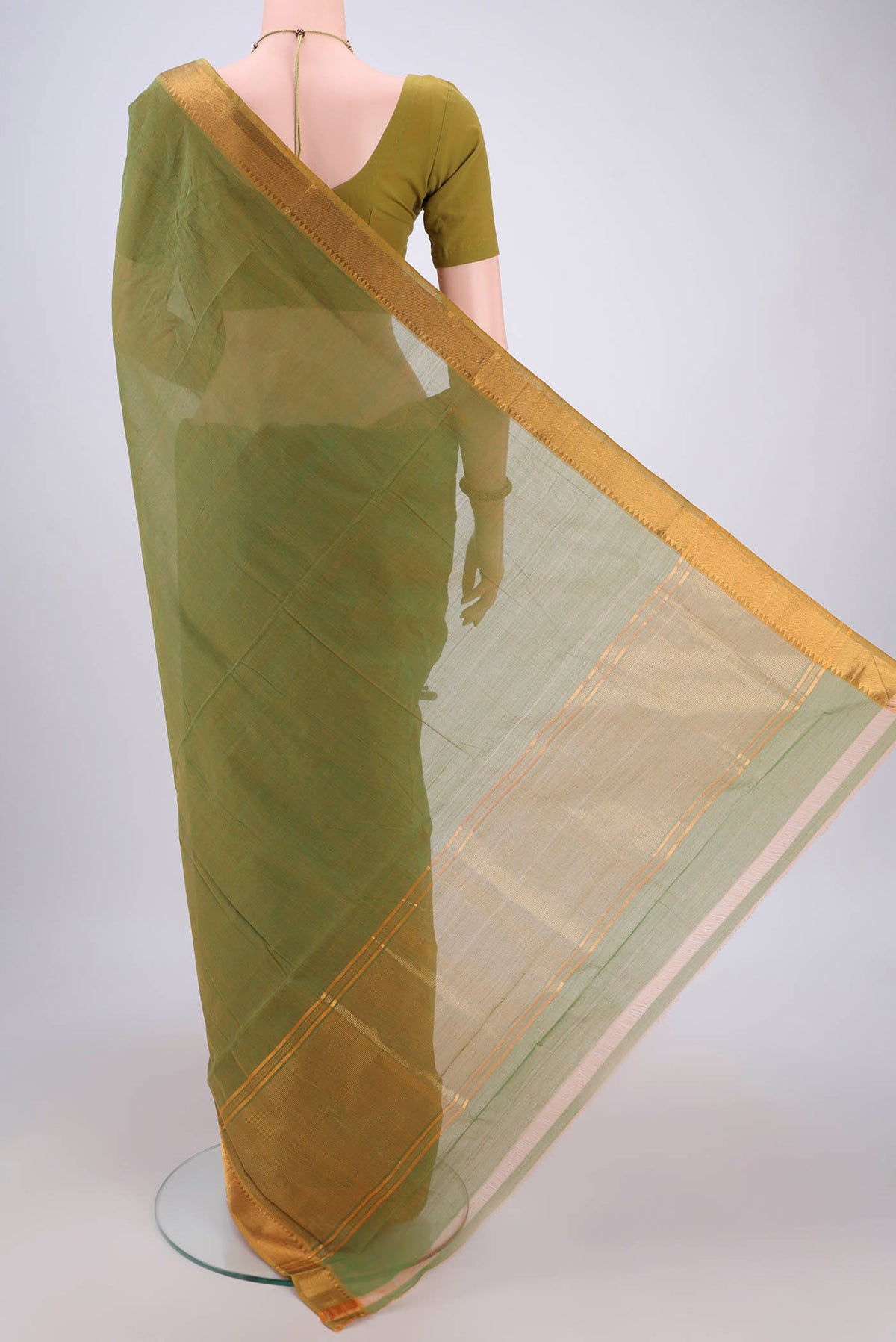 Flat view of Light Green Mangalagiri Cotton Saree with Plain Body and Zari Border. 