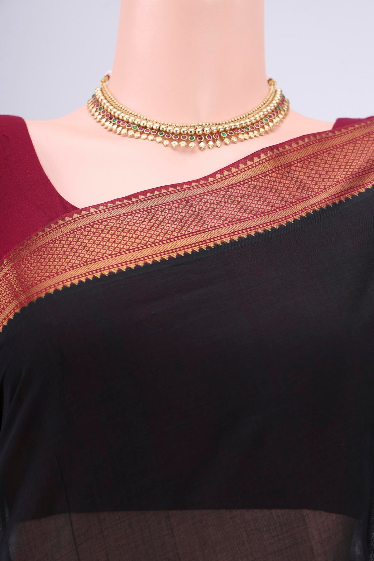 Border image of Black Mangalagiri Cotton Saree with Plain Body and Zari Border. 