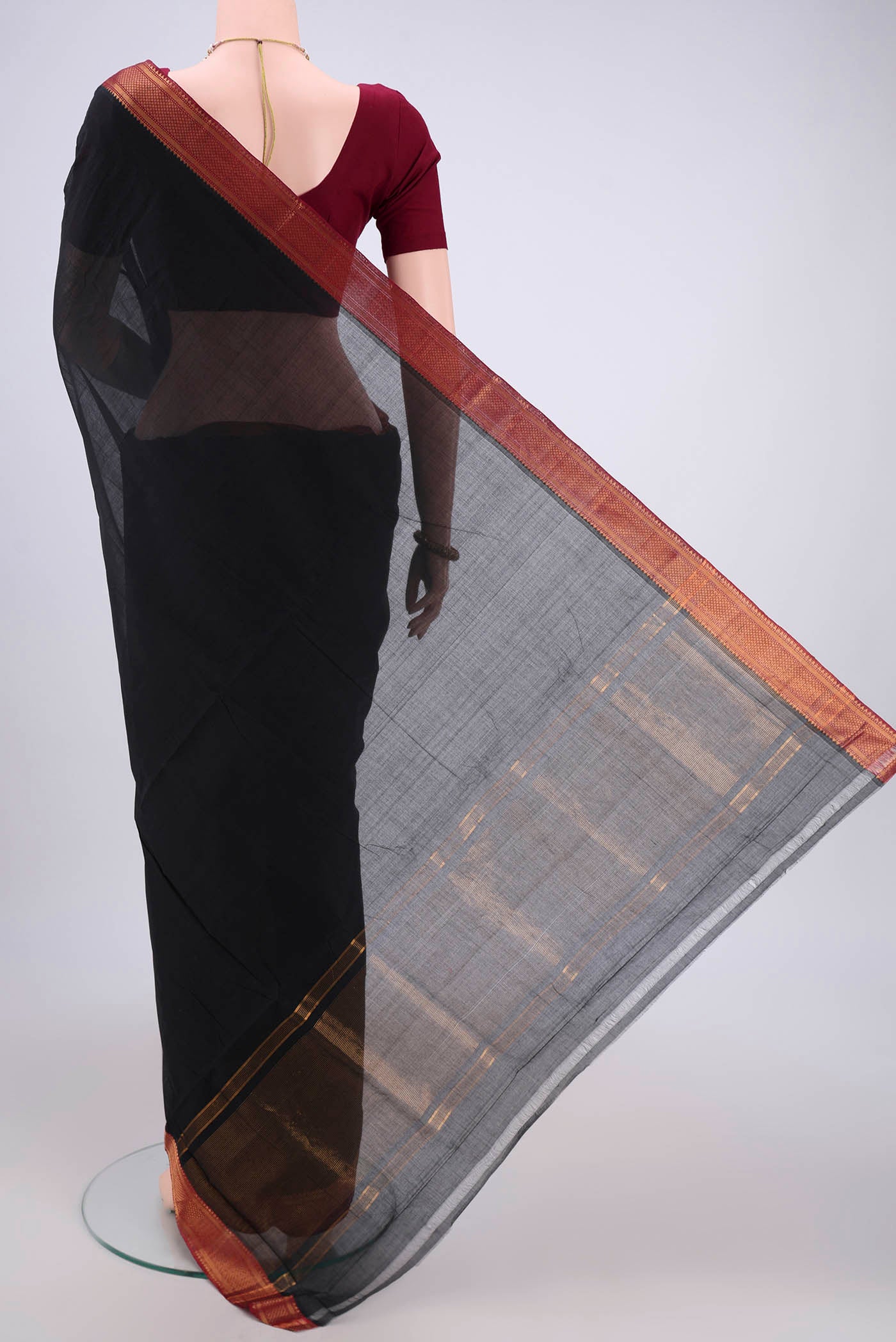 Flat view of Black Mangalagiri Cotton Saree with Plain Body and Zari Border. 