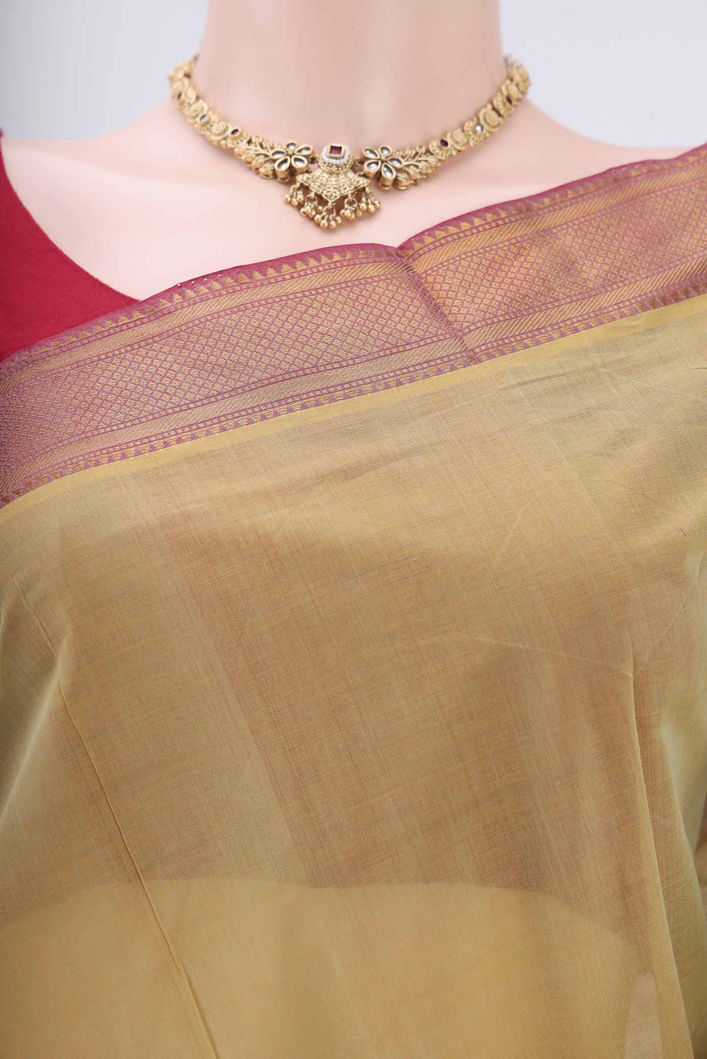 Border image of Golden Mangalagiri Cotton Saree with Plain Body and Zari Border. 