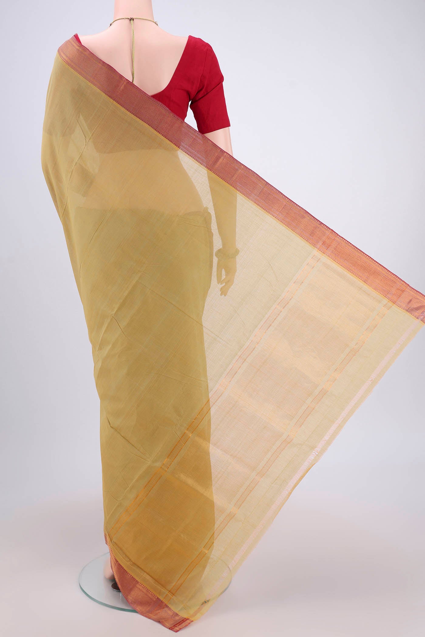Flat view of Golden Mangalagiri Cotton Saree with Plain Body and Zari Border. 