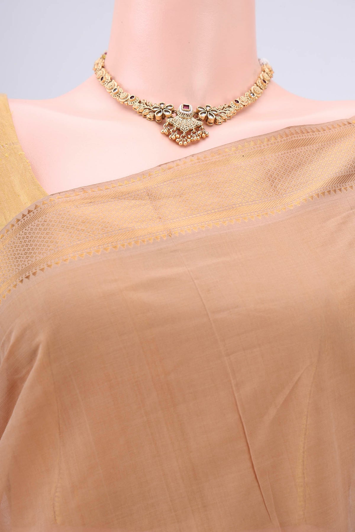 Border image of Beige Mangalagiri Cotton Saree with Plain Body and Zari Border. 