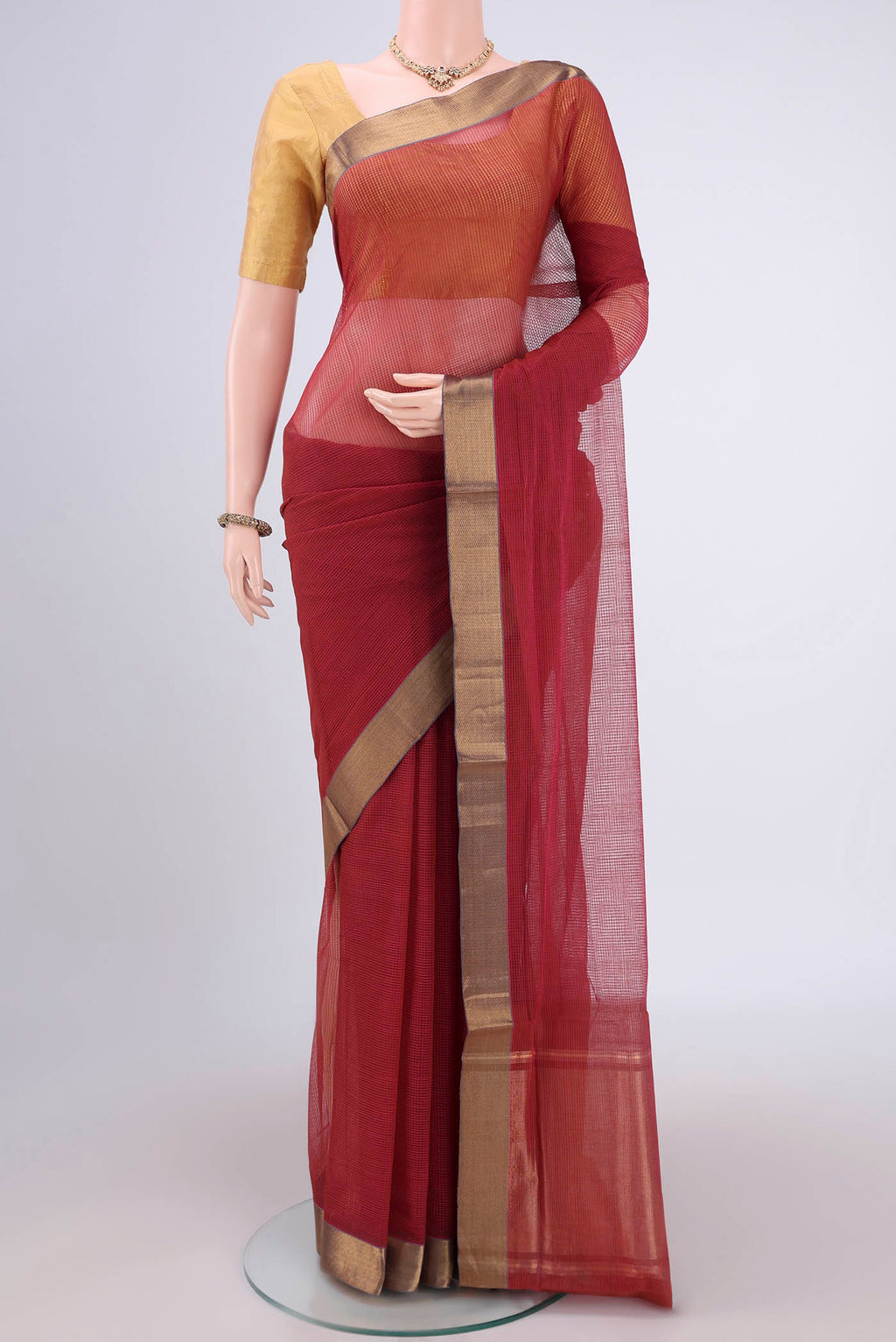 Rust Mangalagiri Cotton Saree with Plain Body and Zari Border.  displayed on a mannequin
