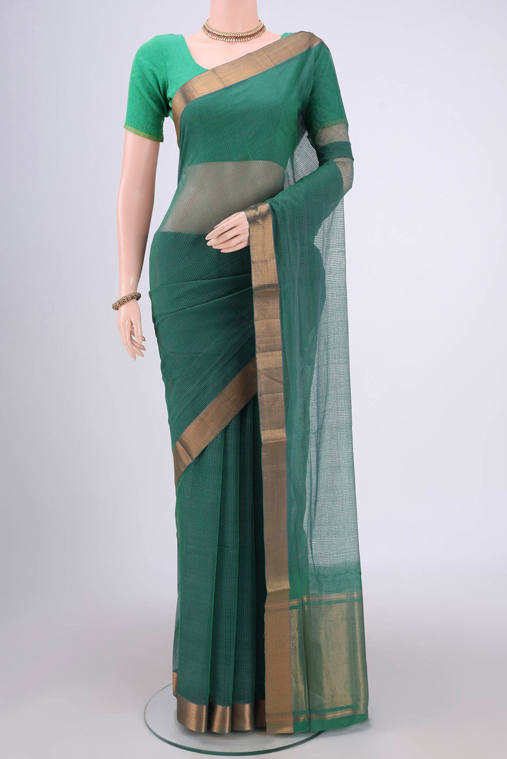 Green Mangalagiri Cotton Saree with Plain Body and Zari Border.  displayed on a mannequin