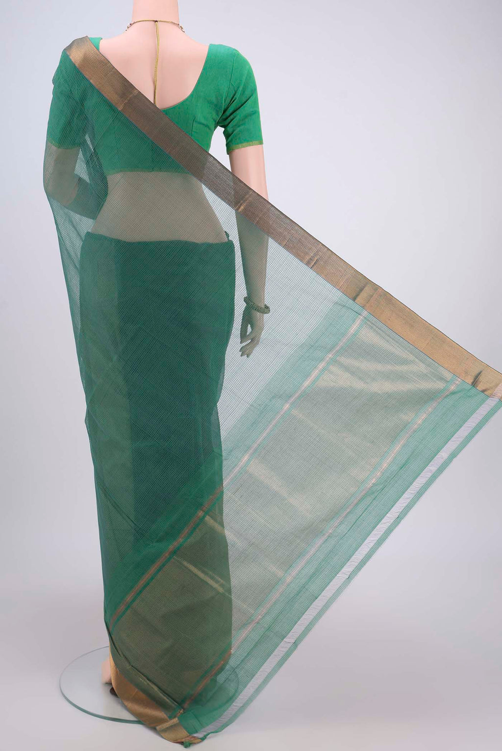 Flat view of Green Mangalagiri Cotton Saree with Plain Body and Zari Border. 