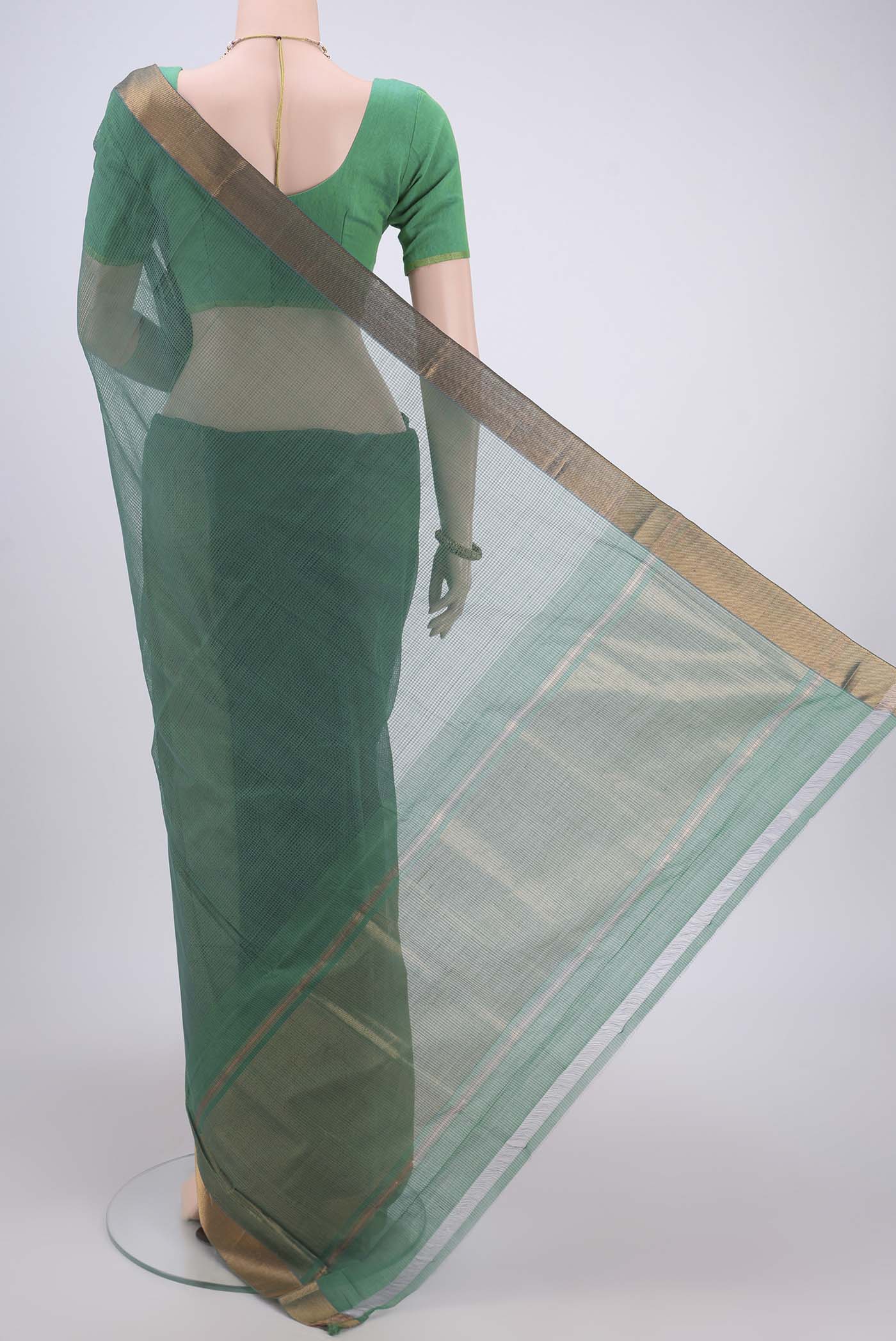 Flat view of Green Mangalagiri Cotton Saree with Plain Body and Zari Border. 