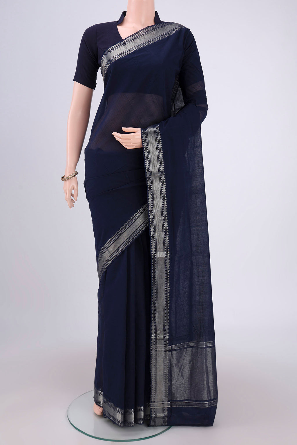 Navy Blue Mangalagiri Cotton Saree with Plain Body and Zari Border.  displayed on a mannequin