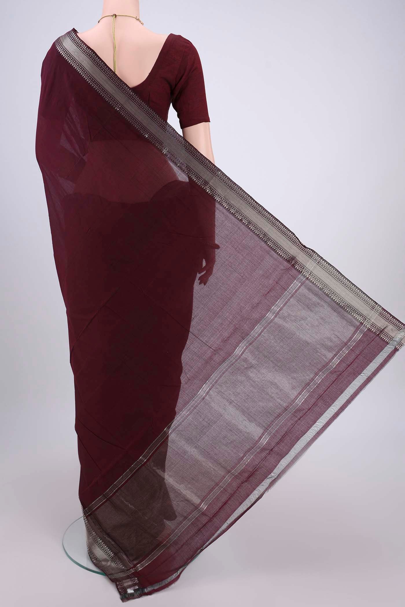 Flat view of Maroon Mangalagiri Cotton Saree with Plain Body and Zari Border. 