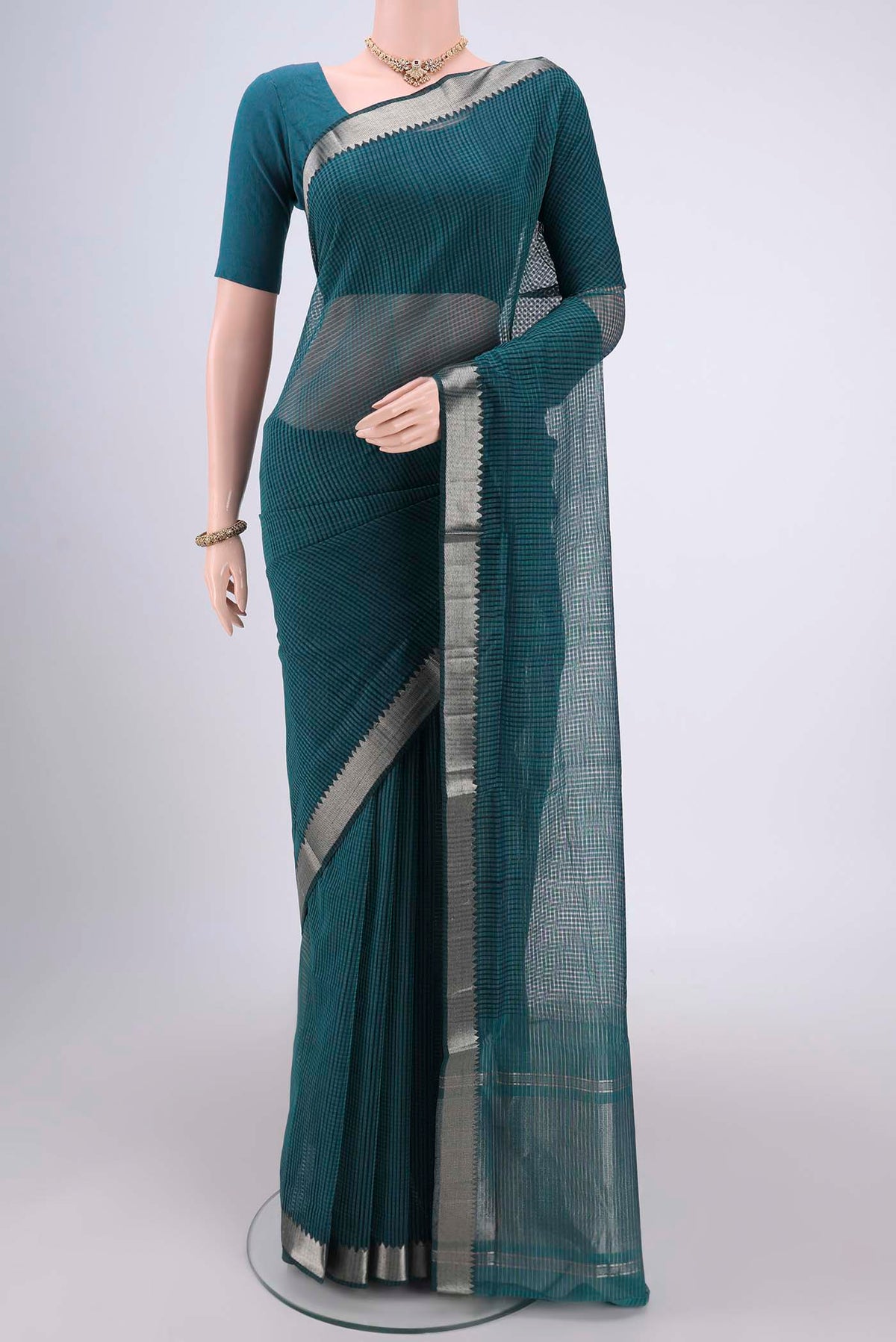Green Mangalagiri Cotton Saree with Plain Body and Zari Border.  displayed on a mannequin