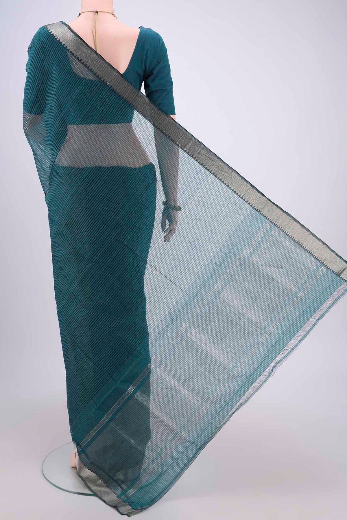 Flat view of Green Mangalagiri Cotton Saree with Plain Body and Zari Border. 