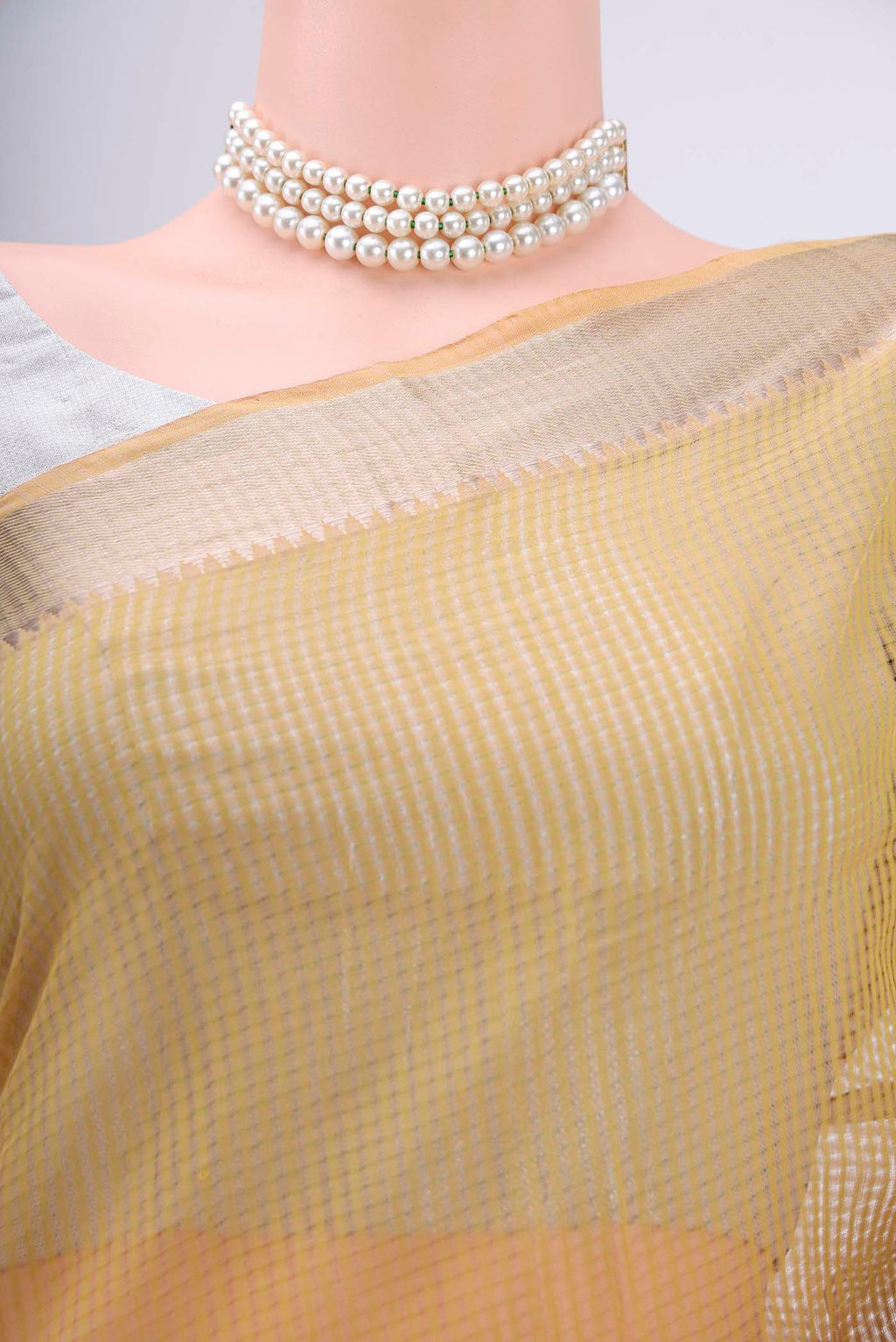 Border image of Mustard Mangalagiri Cotton Saree with Stripes on the body and Zari Border. 