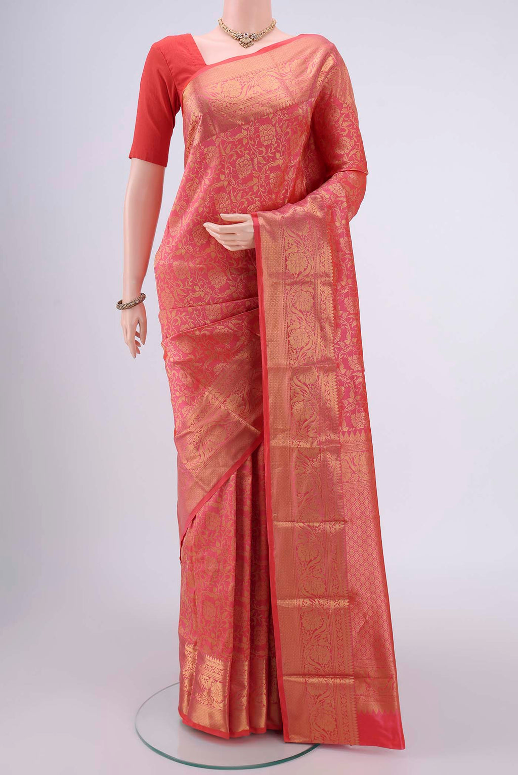 Peach Dual Tone Bangalore Silk Saree with Zari Brocade on the body and Zari Border.  displayed on a mannequin