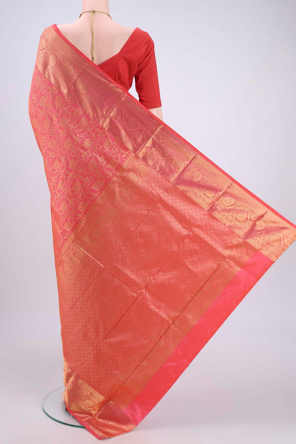 Flat view of Peach Dual Tone Bangalore Silk Saree with Zari Brocade on the body and Zari Border. 