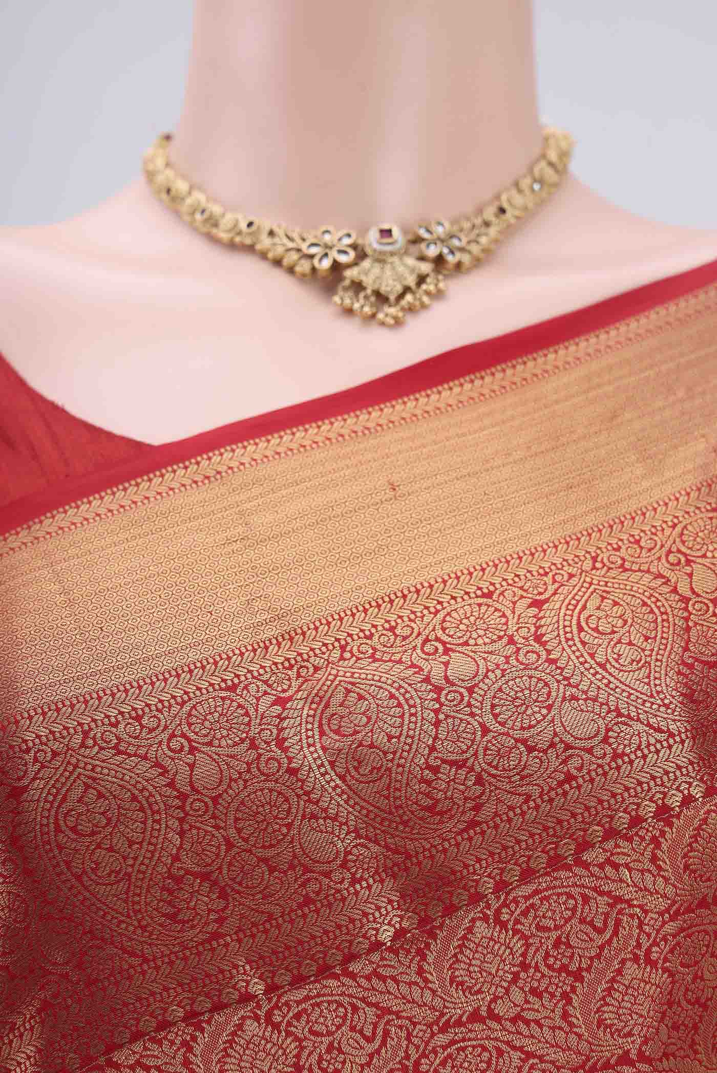 Border image of Red Bangalore Silk Saree with Zari Brocade on the body and Zari Border. 