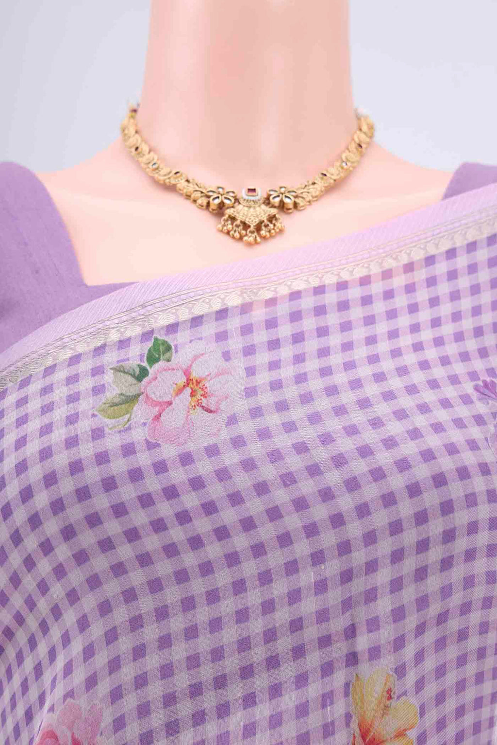 Border image of Lavender Organza Silk Saree with Printed design on the body and Zari Border. 