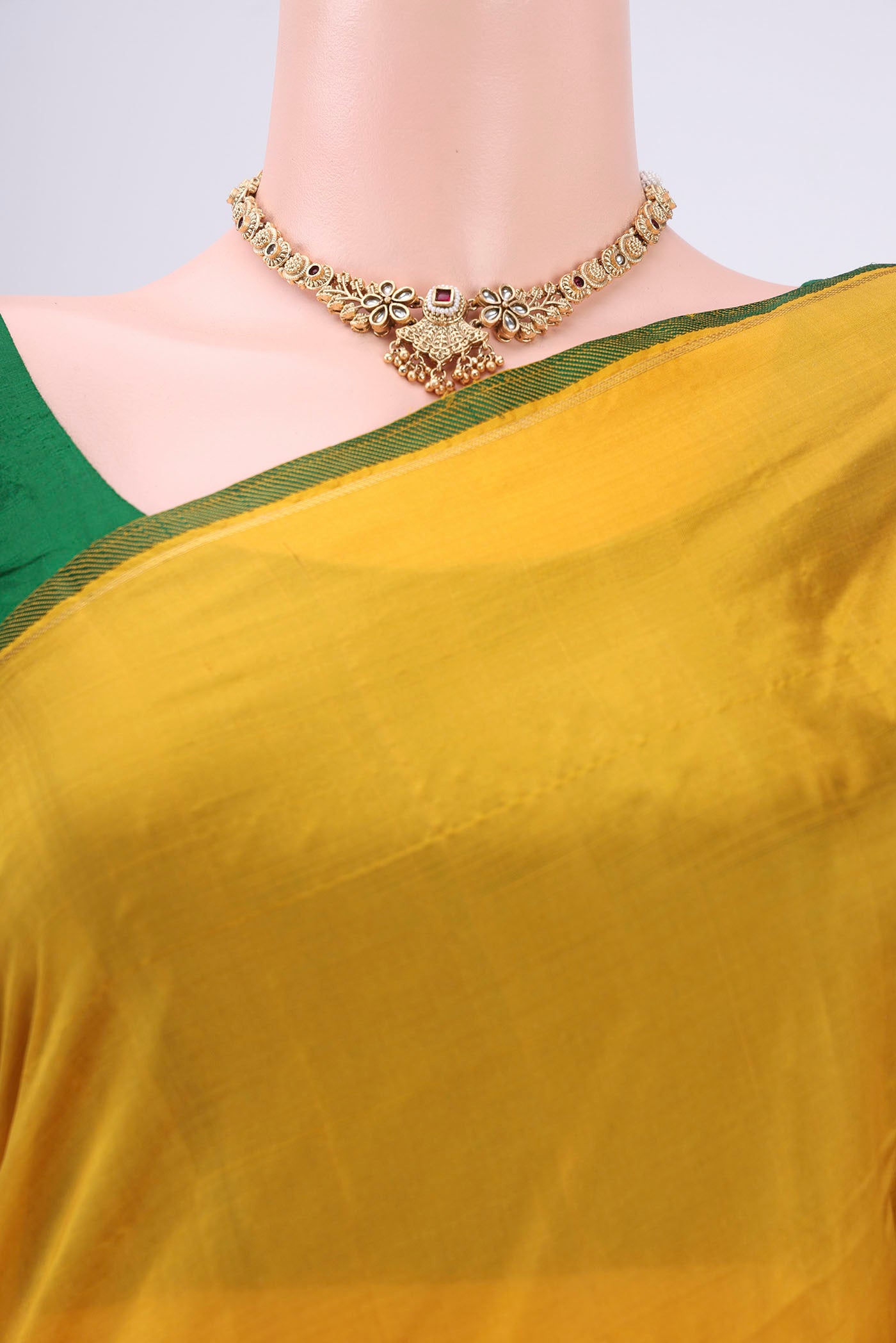 Border image of Mustard Dual Tone Kanchipuram Silk Saree with Plain Body and Zari And Thread Border. 
