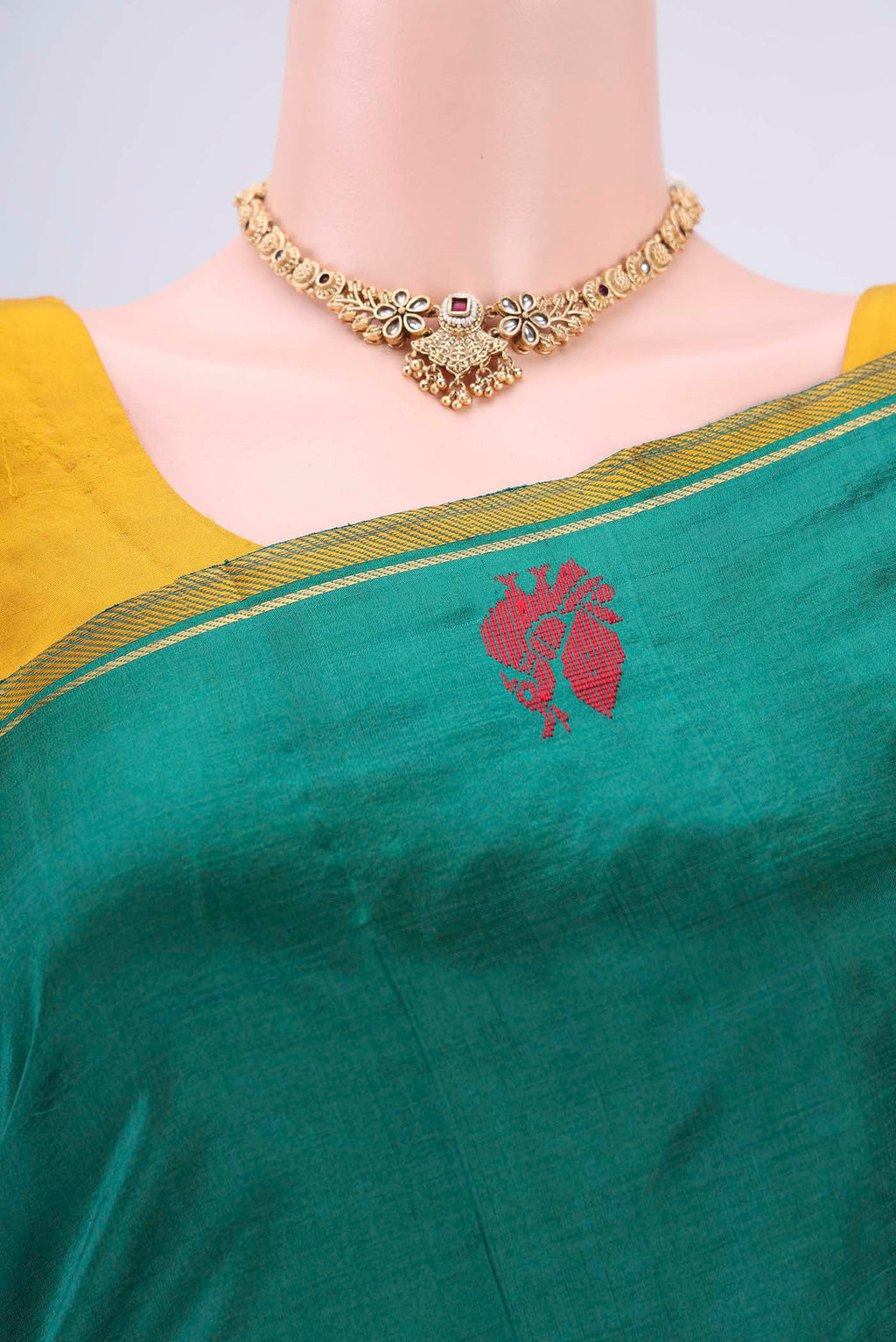 Border image of Green Dual Tone Kanchipuram Silk Saree with Plain Body and Zari And Thread Border. 