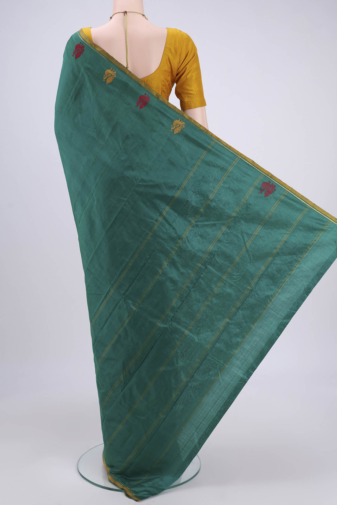 Flat view of Green Dual Tone Kanchipuram Silk Saree with Plain Body and Zari And Thread Border. 