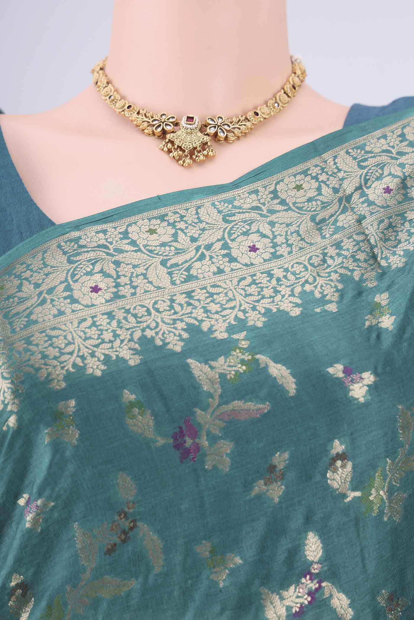 Border image of Sea Green Banarasi Tussar Silk Saree with Zari And Thread Butta on the body and Zari And Thread Border. 