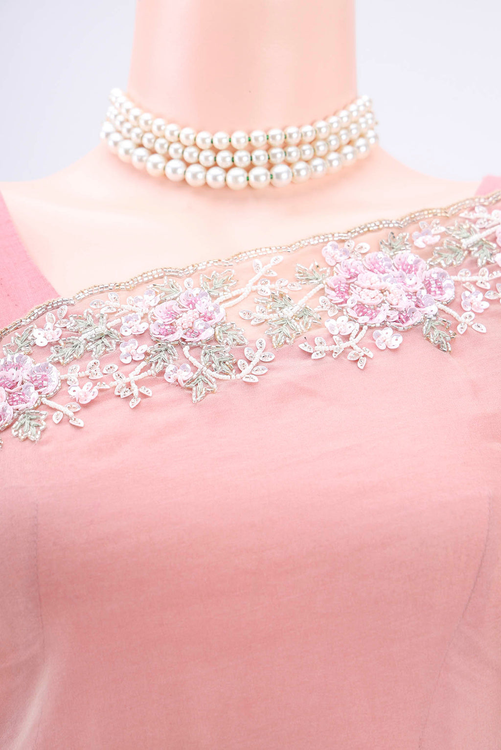 Border image of Beige Organza Silk Saree with Embroidery on the body and Embroidery Border. 