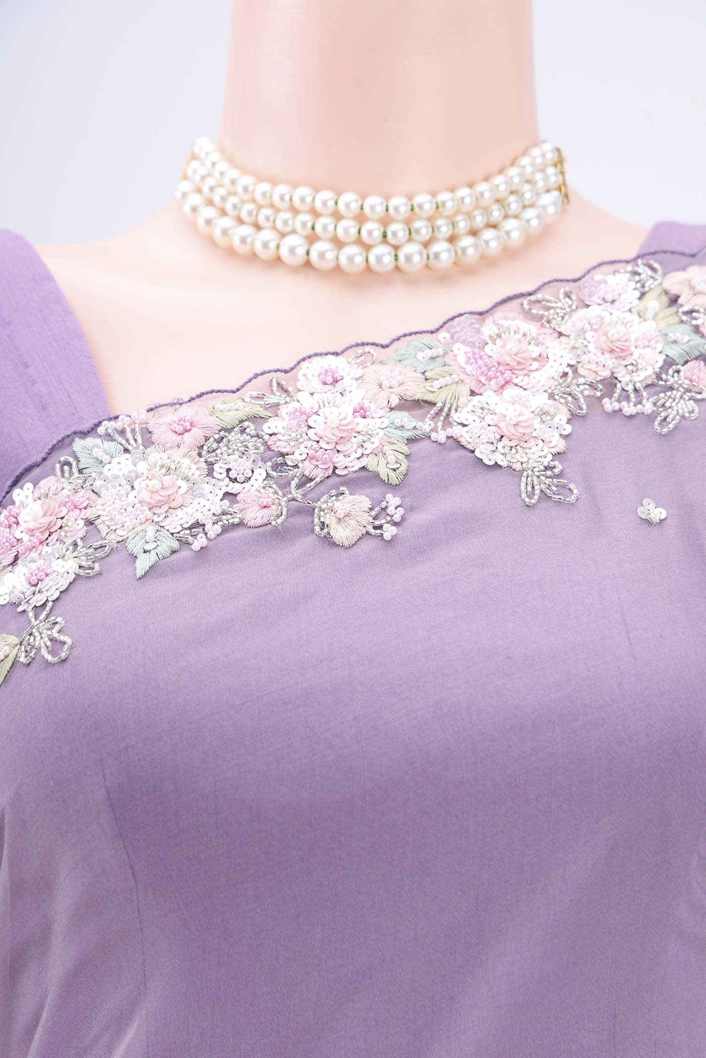 Border image of Dark Mauve Organza Silk Saree with Embroidery on the body and Embroidery Border. 