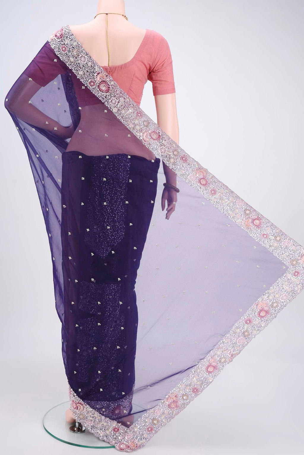Flat view of Purple Organza Silk Saree with Embroidery on the body and Embroidery Border. 