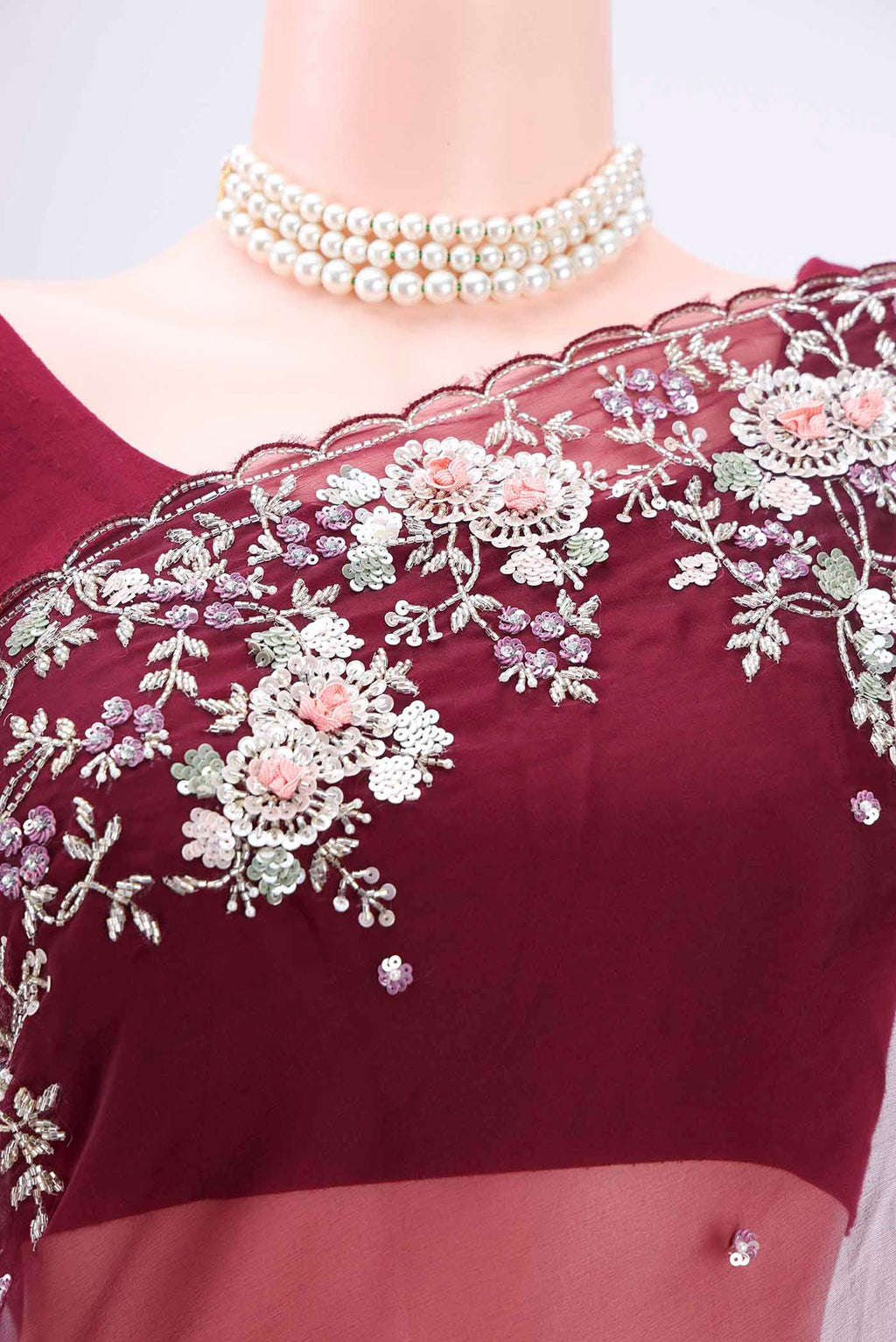 Border image of Maroon Organza Silk Saree with Embroidery on the body and Embroidery Border. 
