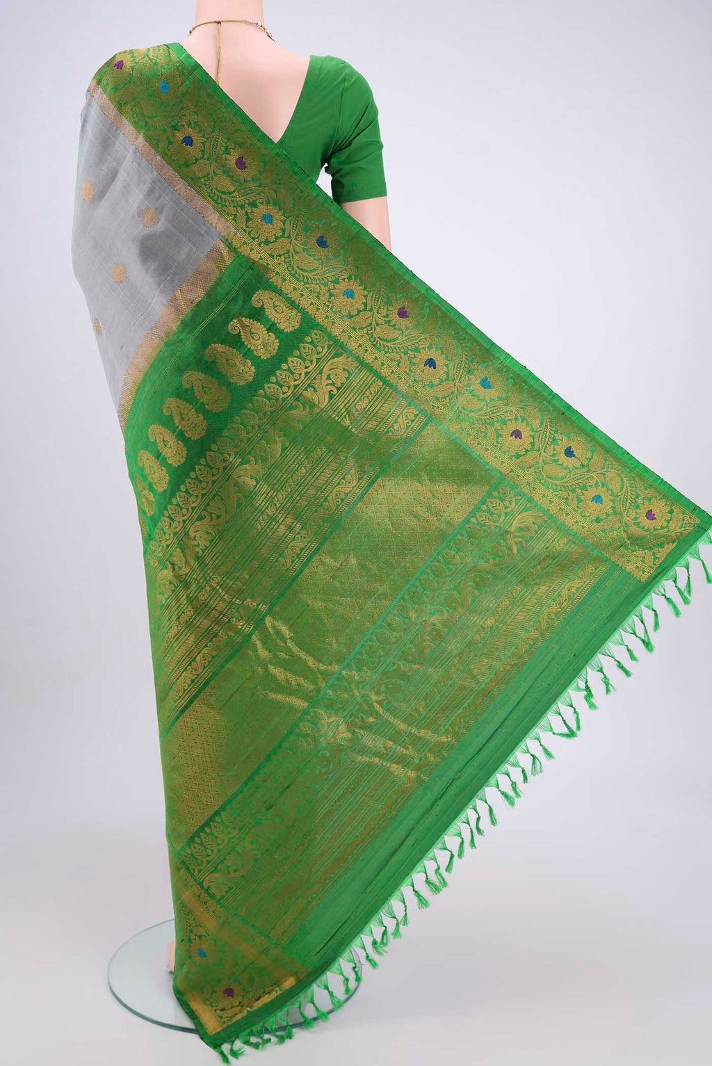 Flat view of Grey Gadwal Silk Saree with Zari Brocade on the body and Zari Border. 
