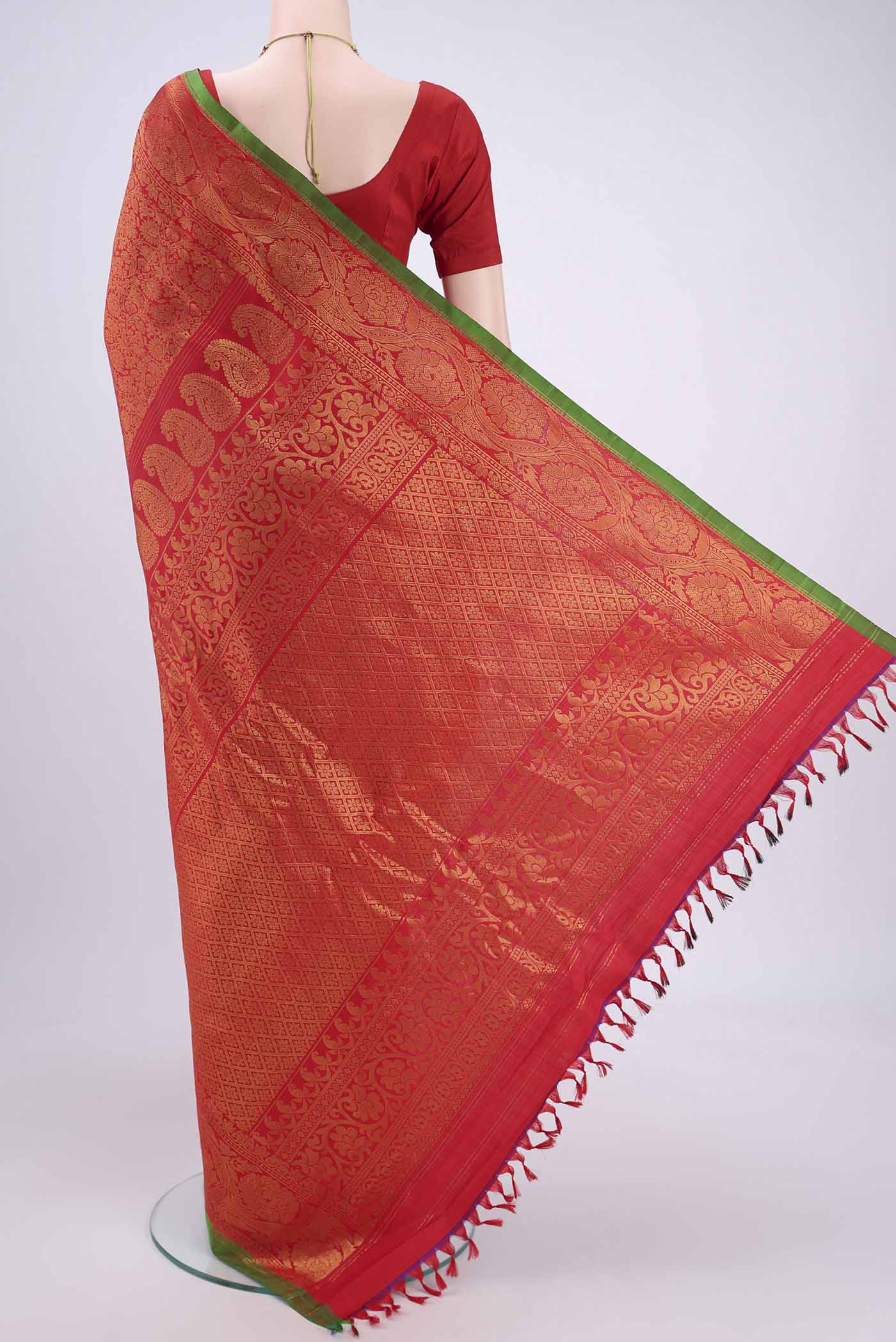 Flat view of Red Dual Tone Gadwal Silk Saree with Zari Brocade on the body and Zari Border. 