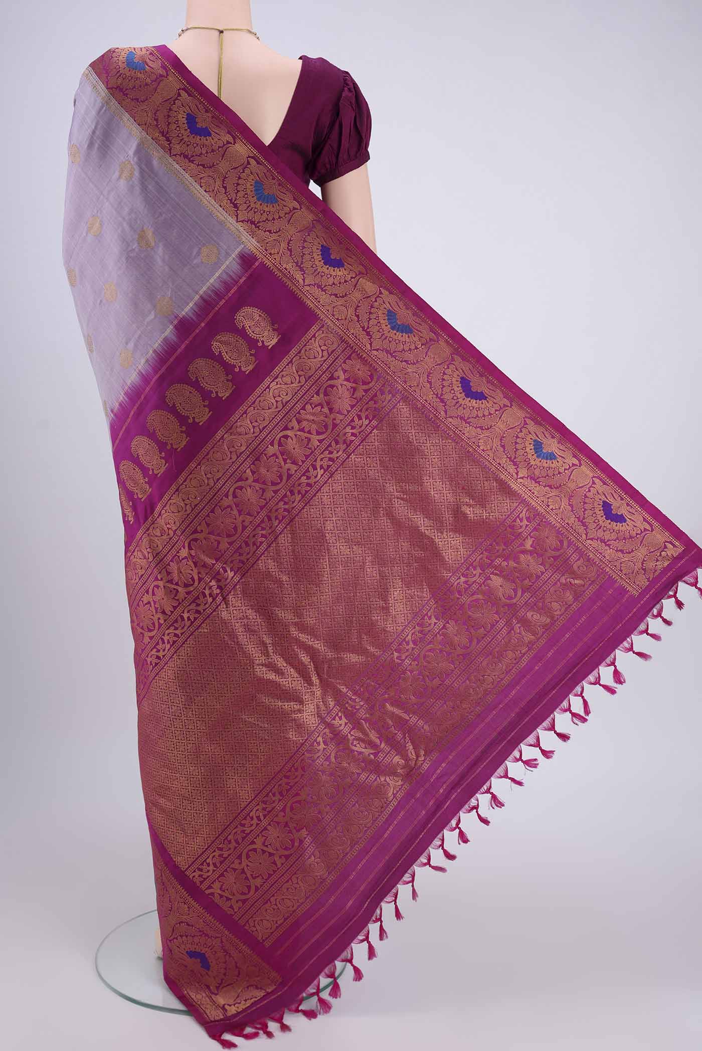 Flat view of Mauve Gadwal Silk Saree with Zari Brocade on the body and Zari Border. 