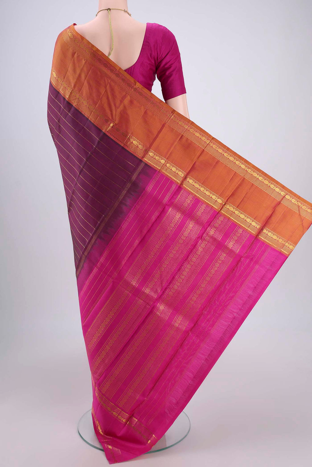 Flat view of Magenta Dual Tone Kanjivaram Silk Saree with Veldhari on the body and Ganga Jamuna Border. 