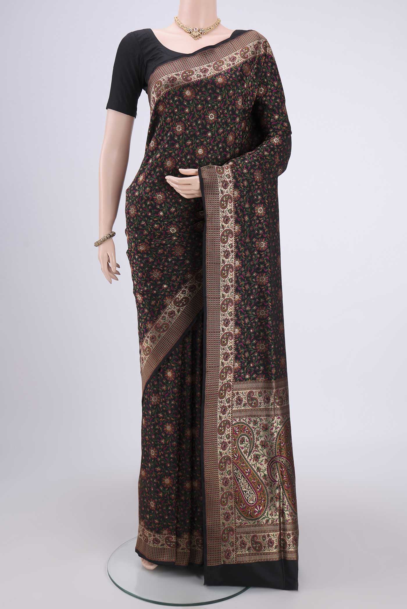 Black Banarasi Tanchoi Silk Saree with Jacquard design on the body and Thread Border.  displayed on a mannequin