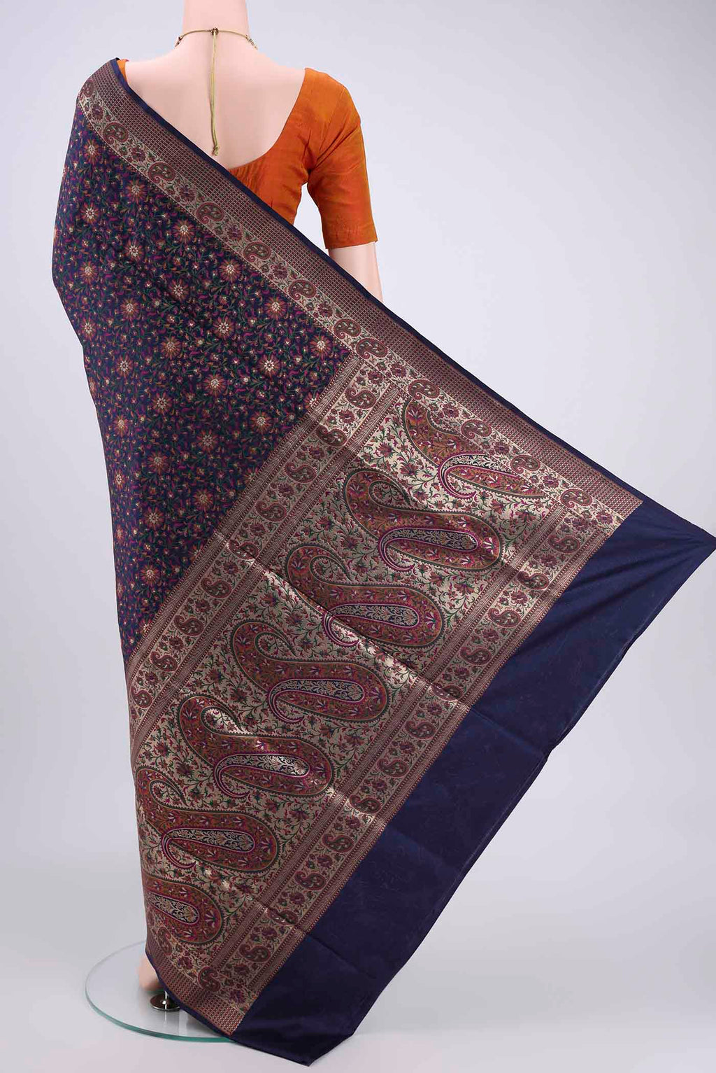 Flat view of Navy Blue Banarasi Silk Saree with Jacquard With Zari Butta on the body and Zari And Thread Border. 