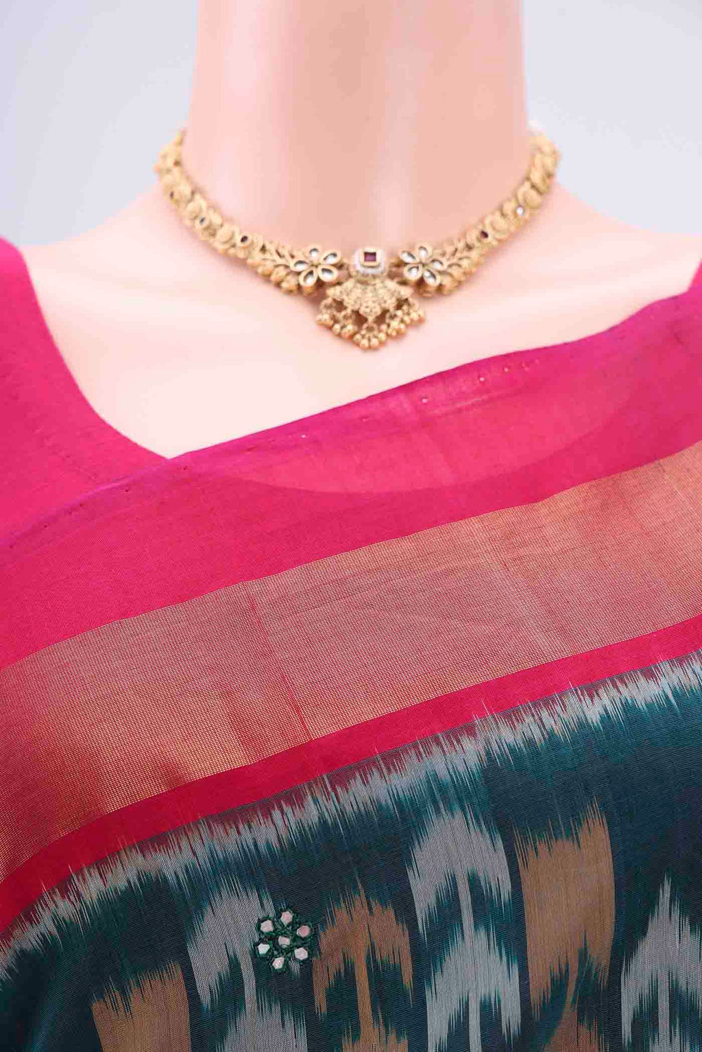 Border image of Turquoise Pochampally Silk Saree with Pure Ikat on the body and Plain Border. 