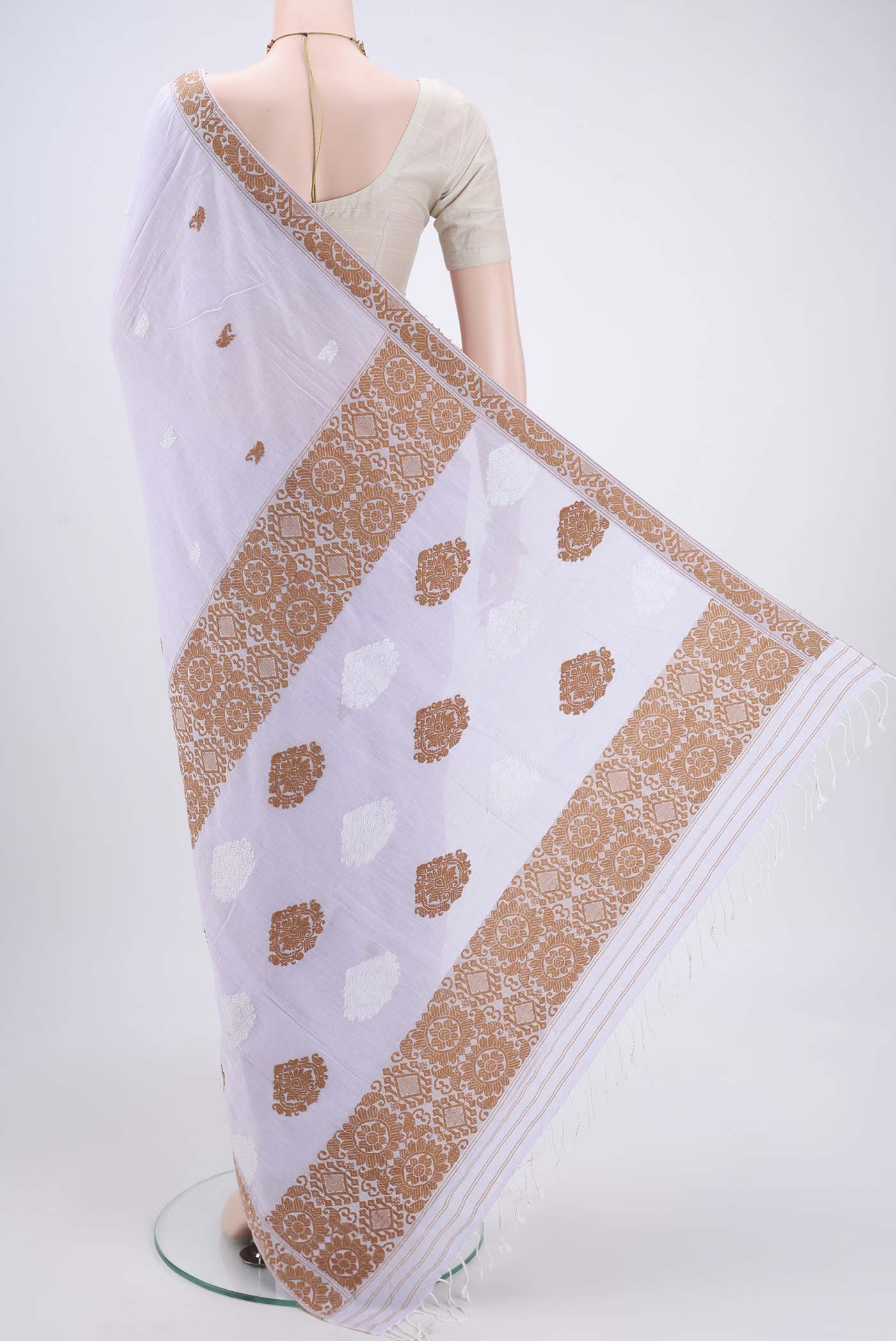 Flat view of Purple Assam Cotton Saree with Thread Butta on the body and Plain Border. 
