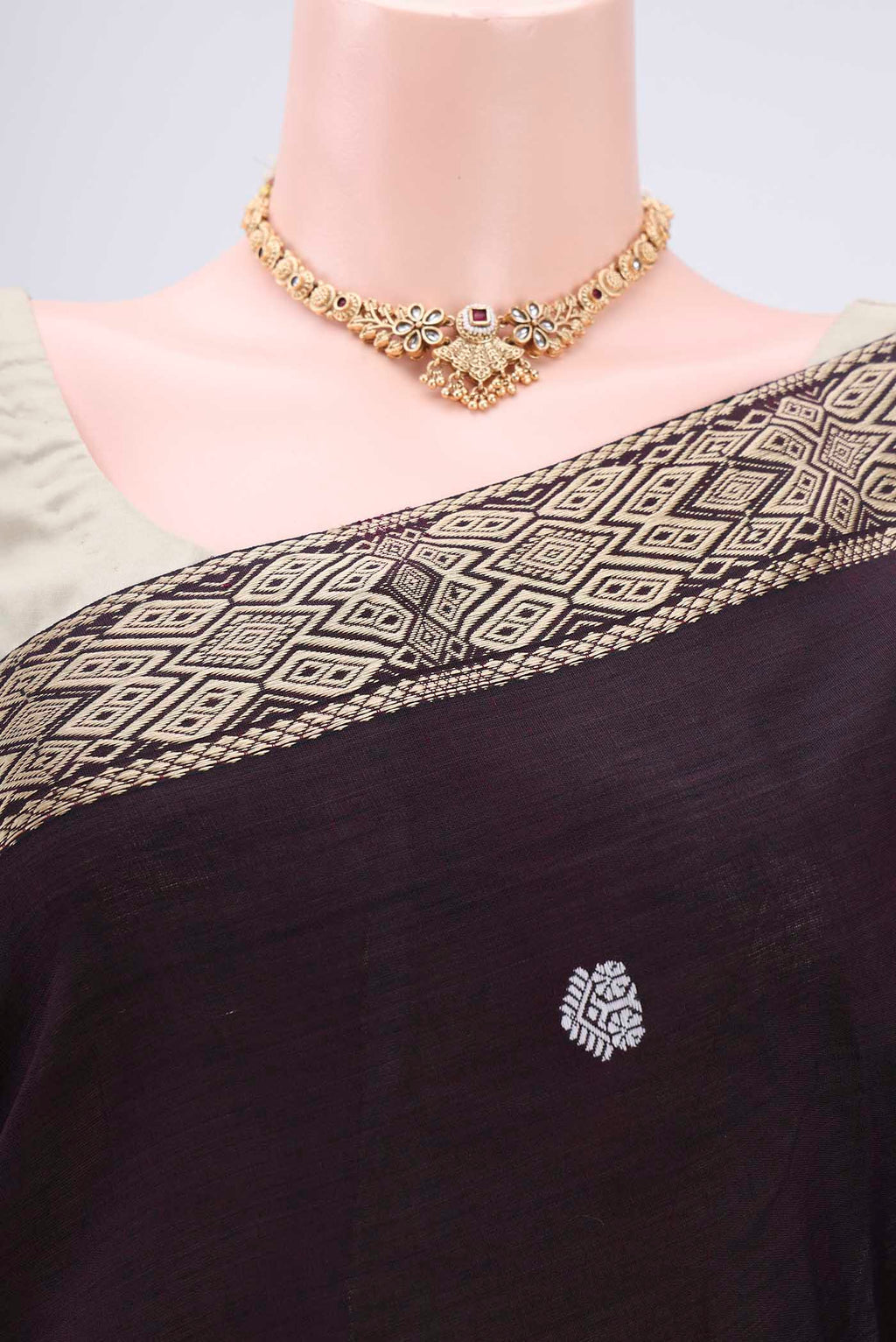 Border image of Coffee Brown Assam Cotton Saree with Thread Butta on the body and Plain Border. 