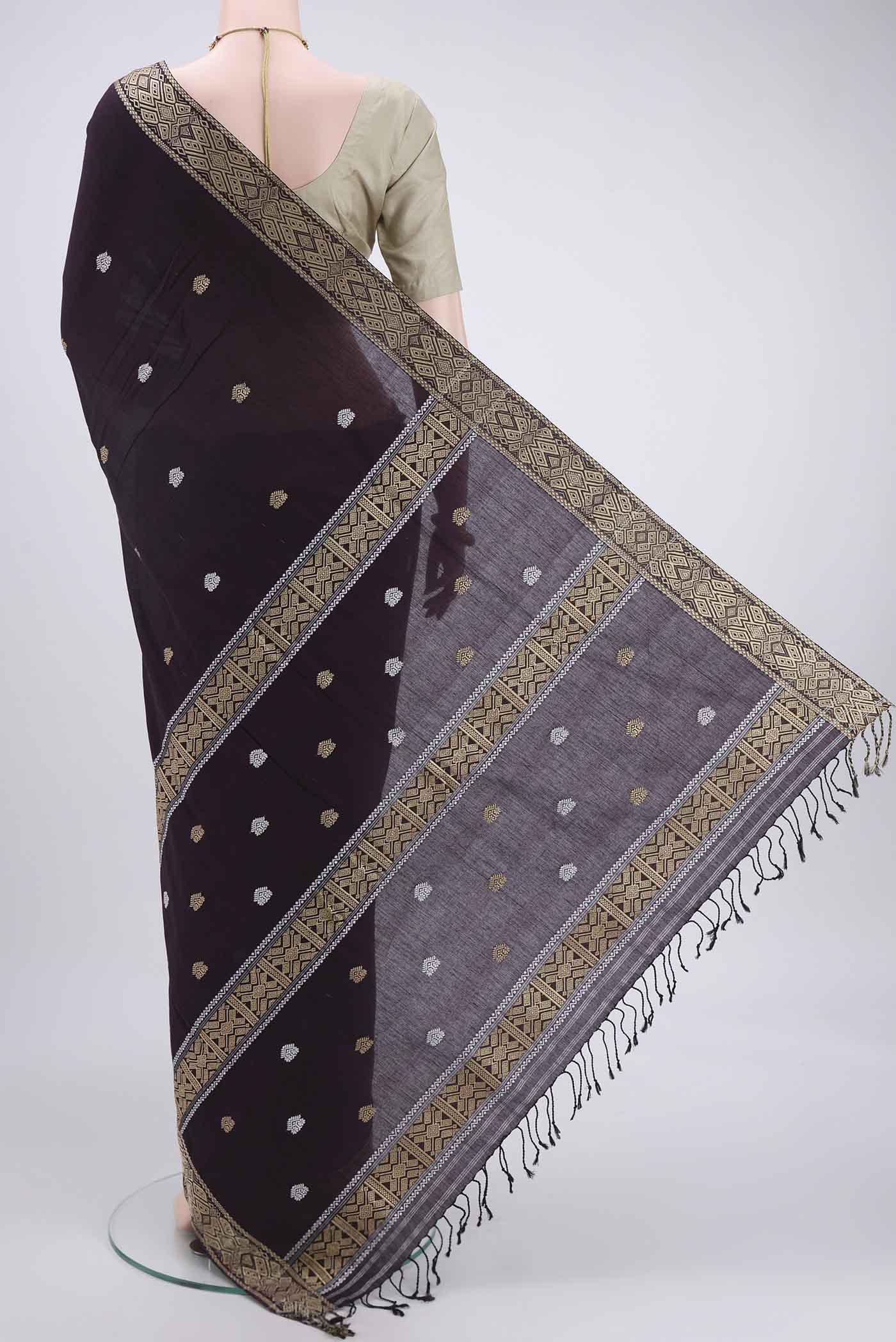 Flat view of Coffee Brown Assam Cotton Saree with Thread Butta on the body and Plain Border. 