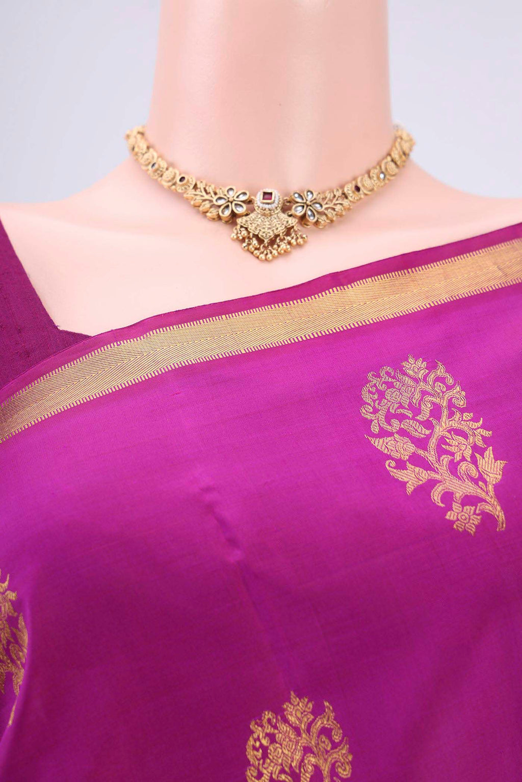 Border image of Magenta Kanchipuram Silk Saree with Zari Butta on the body and Zari Border. 