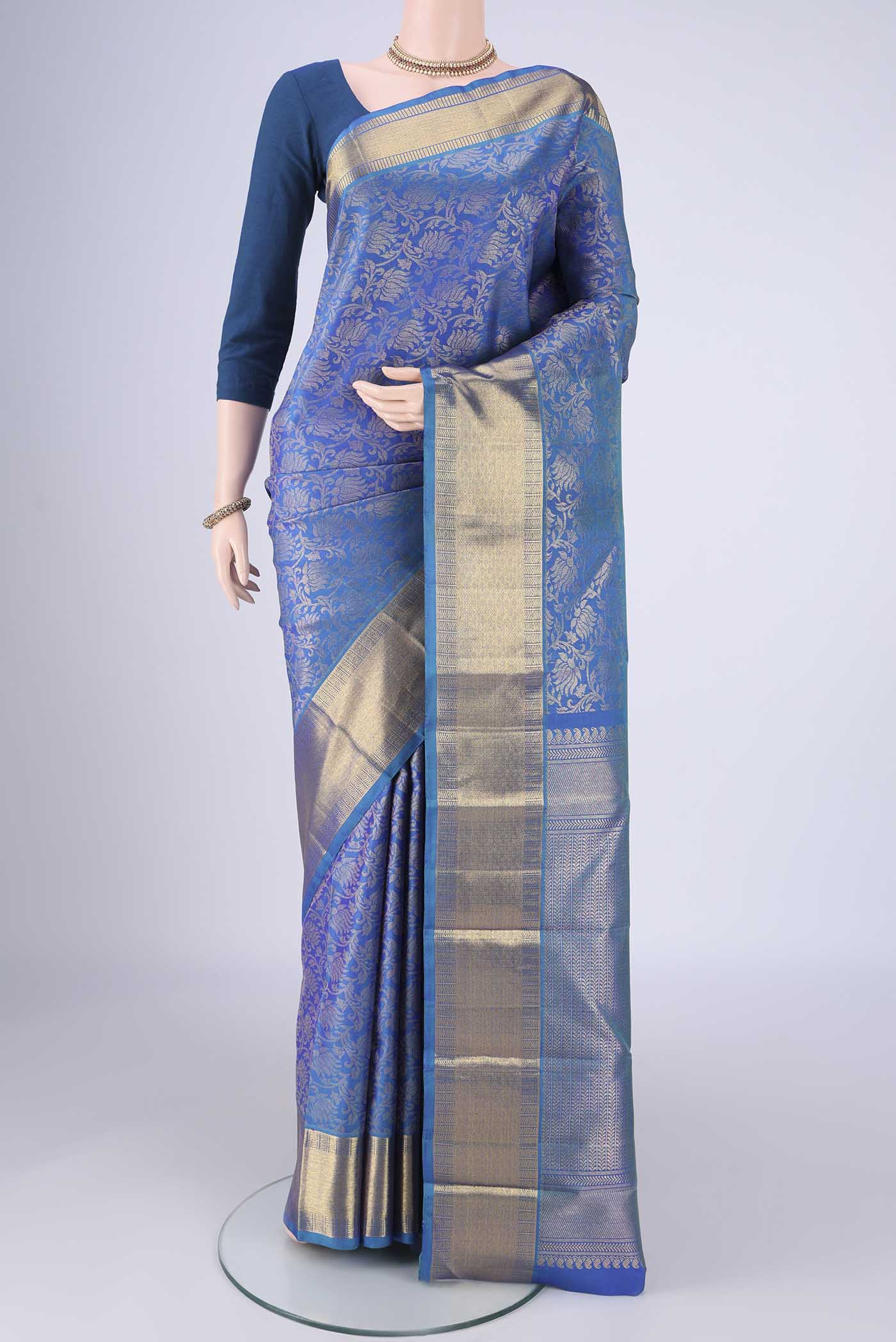 Pure Silk Pure Zari Royal Blue Kanjivaram Saree with Zari Brocade on the body and Zari Border.  displayed on a mannequin