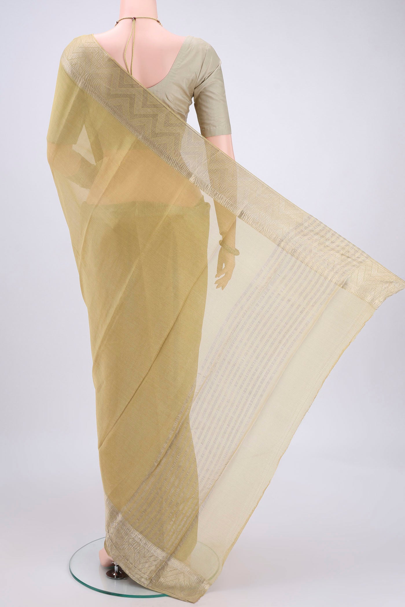 Flat view of Yellow Mysore Crepe Saree with Fancy on the body and Zari Border. 