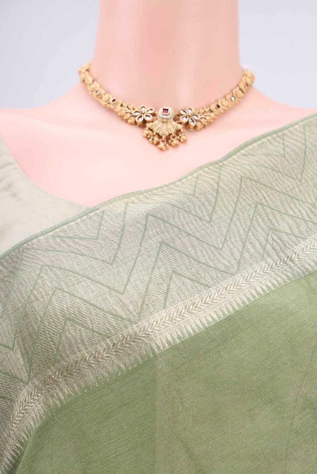 Border image of Light Green Mysore Crepe Saree with Fancy on the body and Zari Border. 