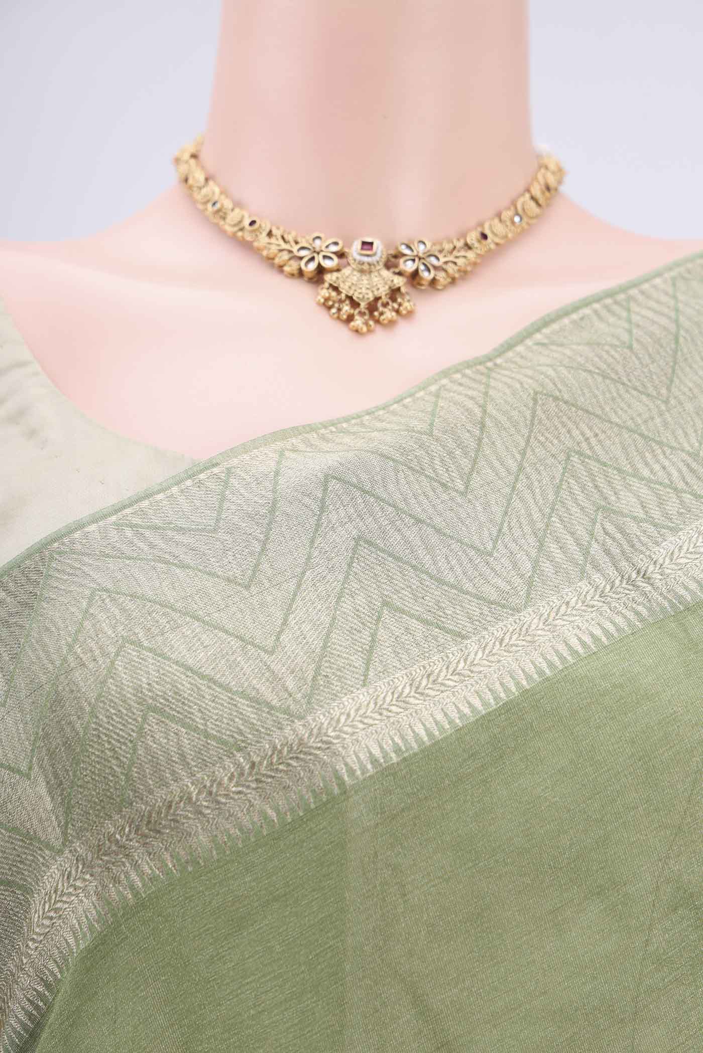 Border image of Light Green Mysore Crepe Saree with Fancy on the body and Zari Border. 