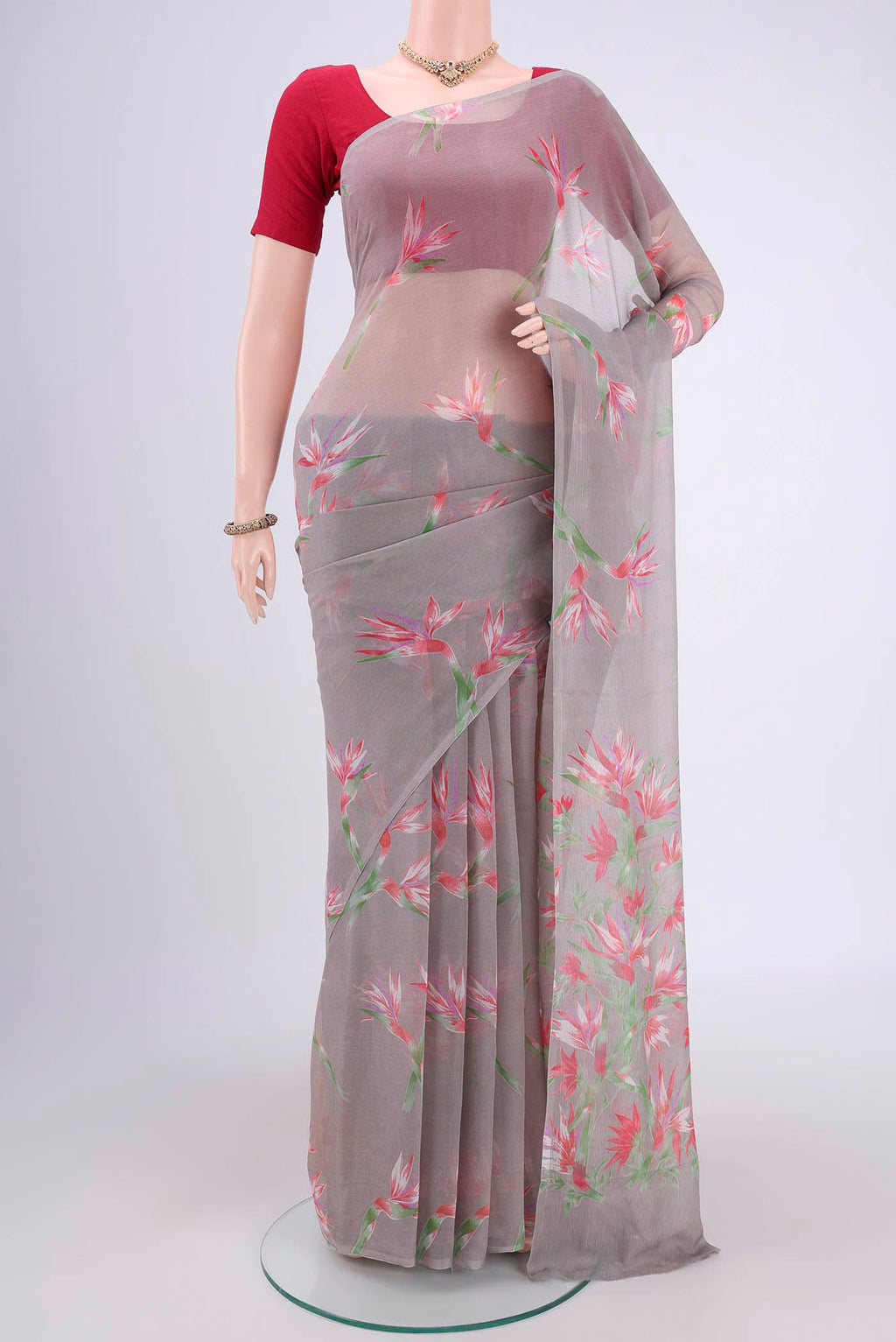 Grey Mysore Chiffon Saree with Floral Print on the body and Without Border.  displayed on a mannequin