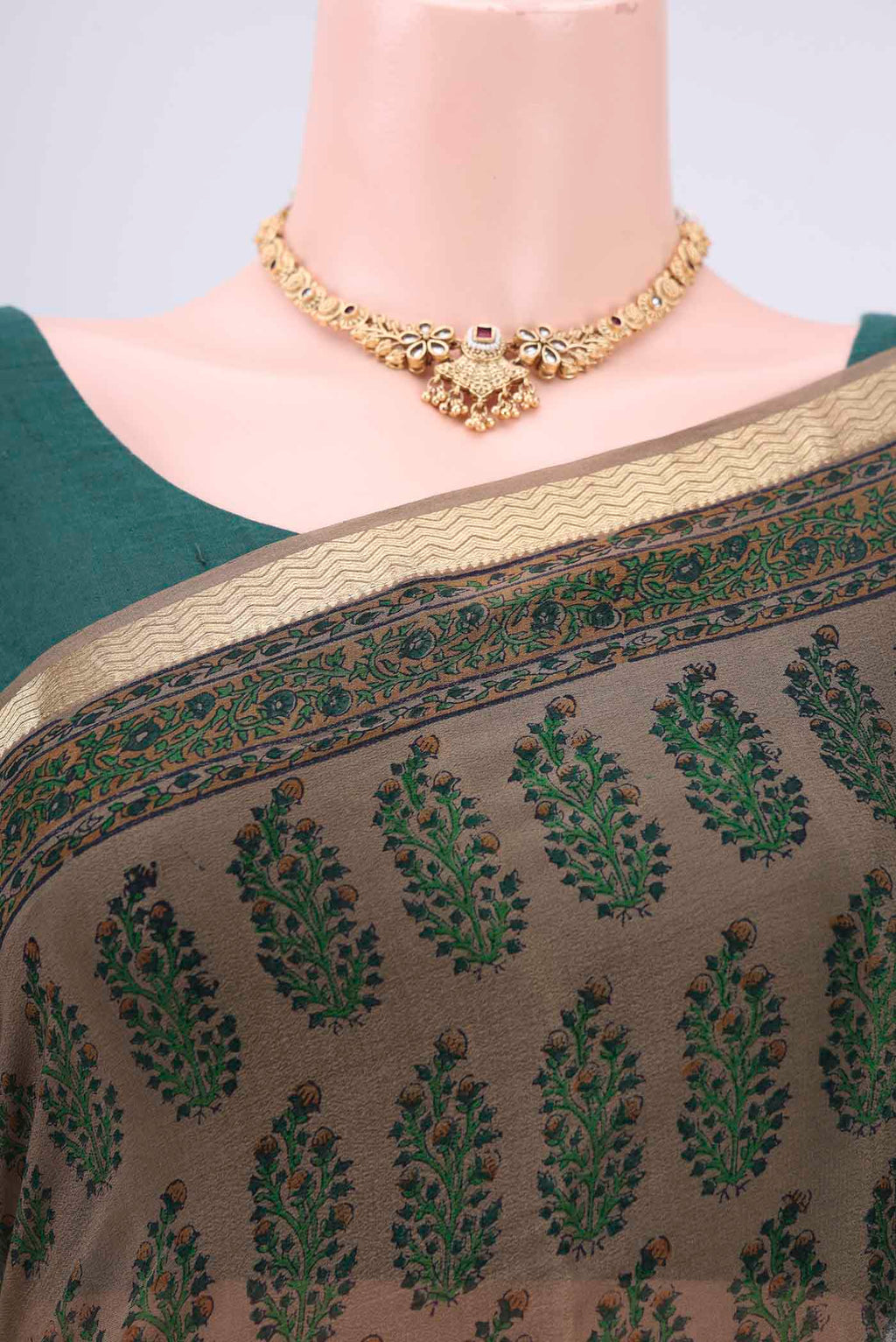 Border image of Brown Mysore Crepe Saree with Floral Print on the body and Zari Border. 