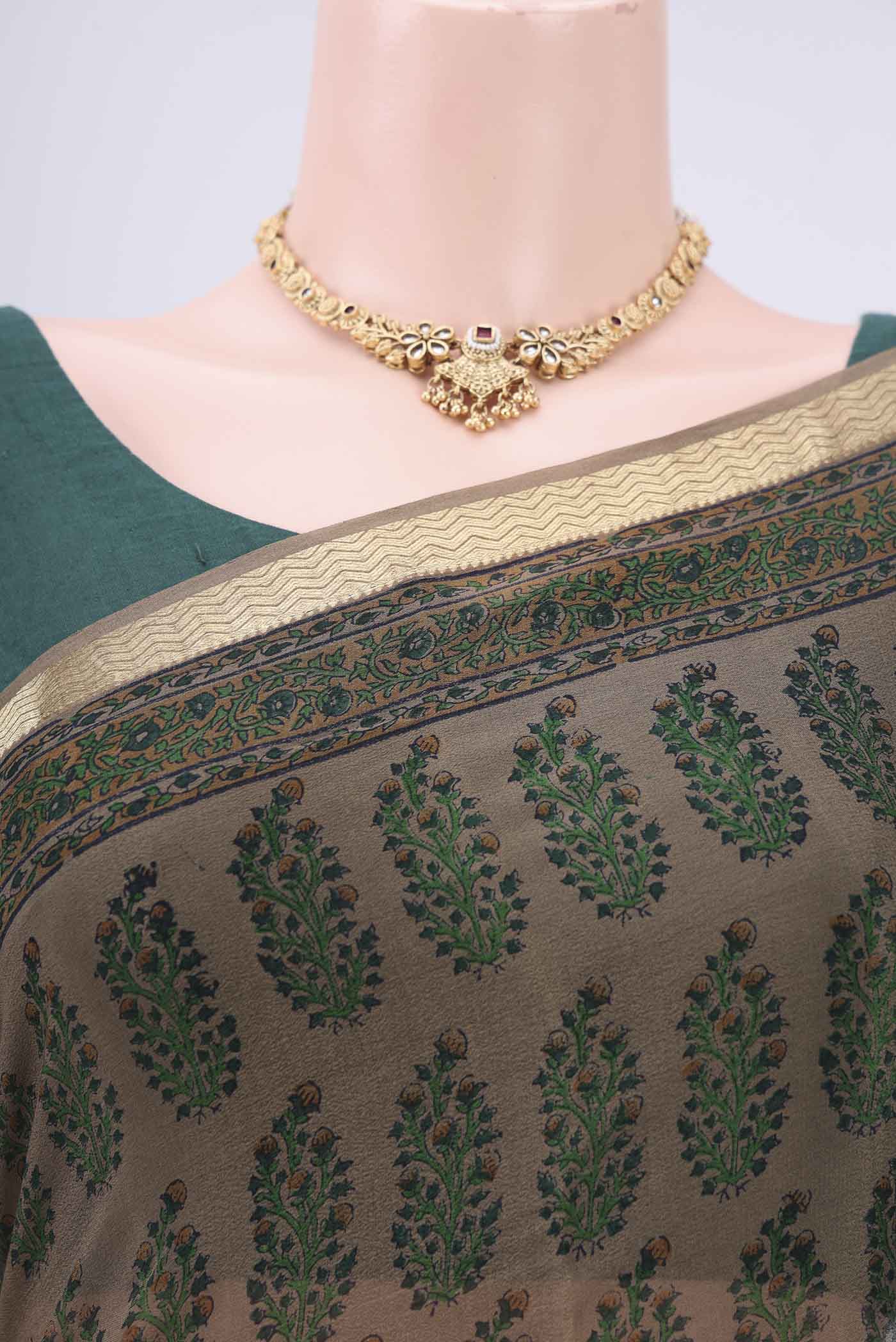 Border image of Brown Mysore Crepe Saree with Floral Print on the body and Zari Border. 