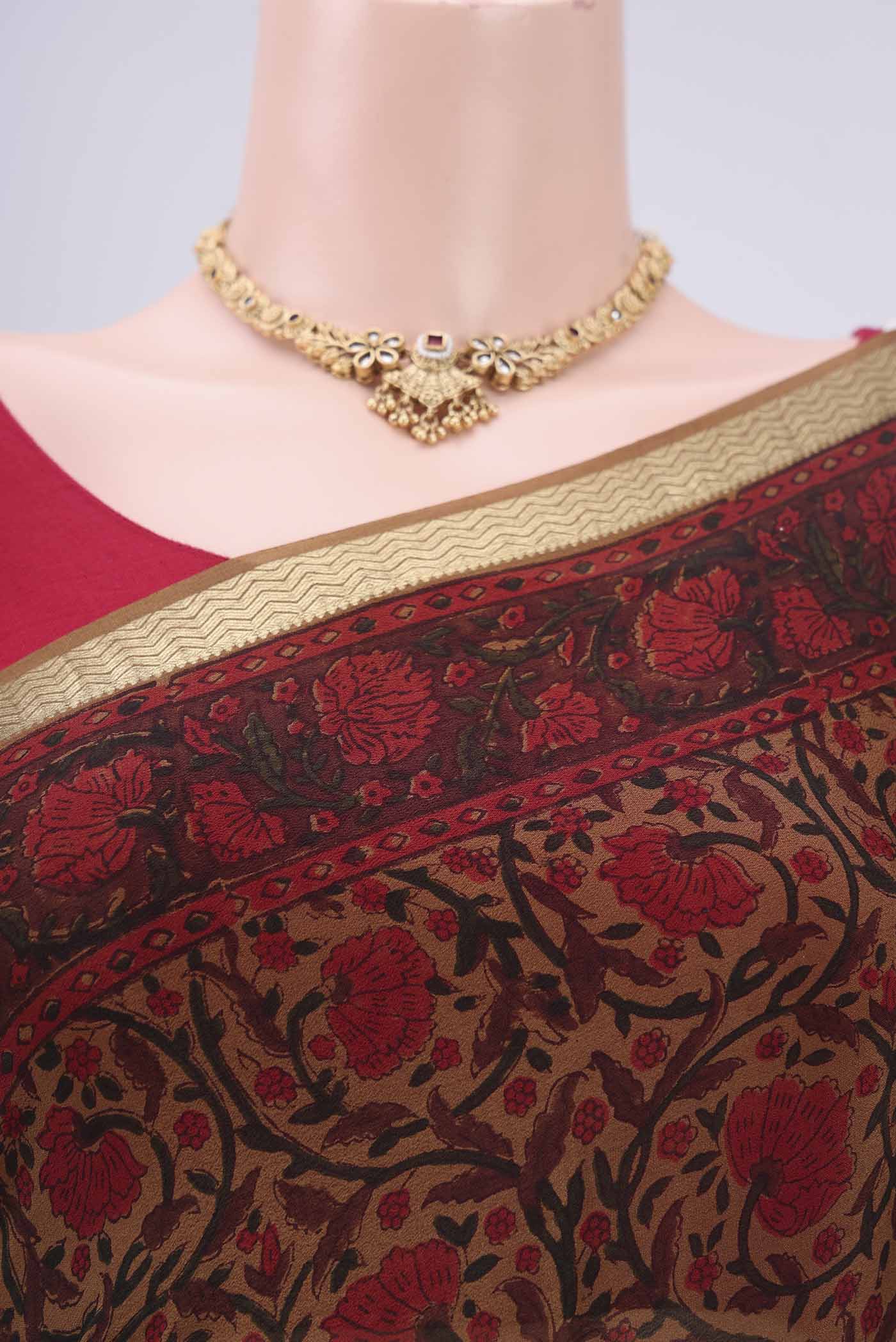 Border image of Mustard Mysore Crepe Saree with Floral Print on the body and Zari Border. 