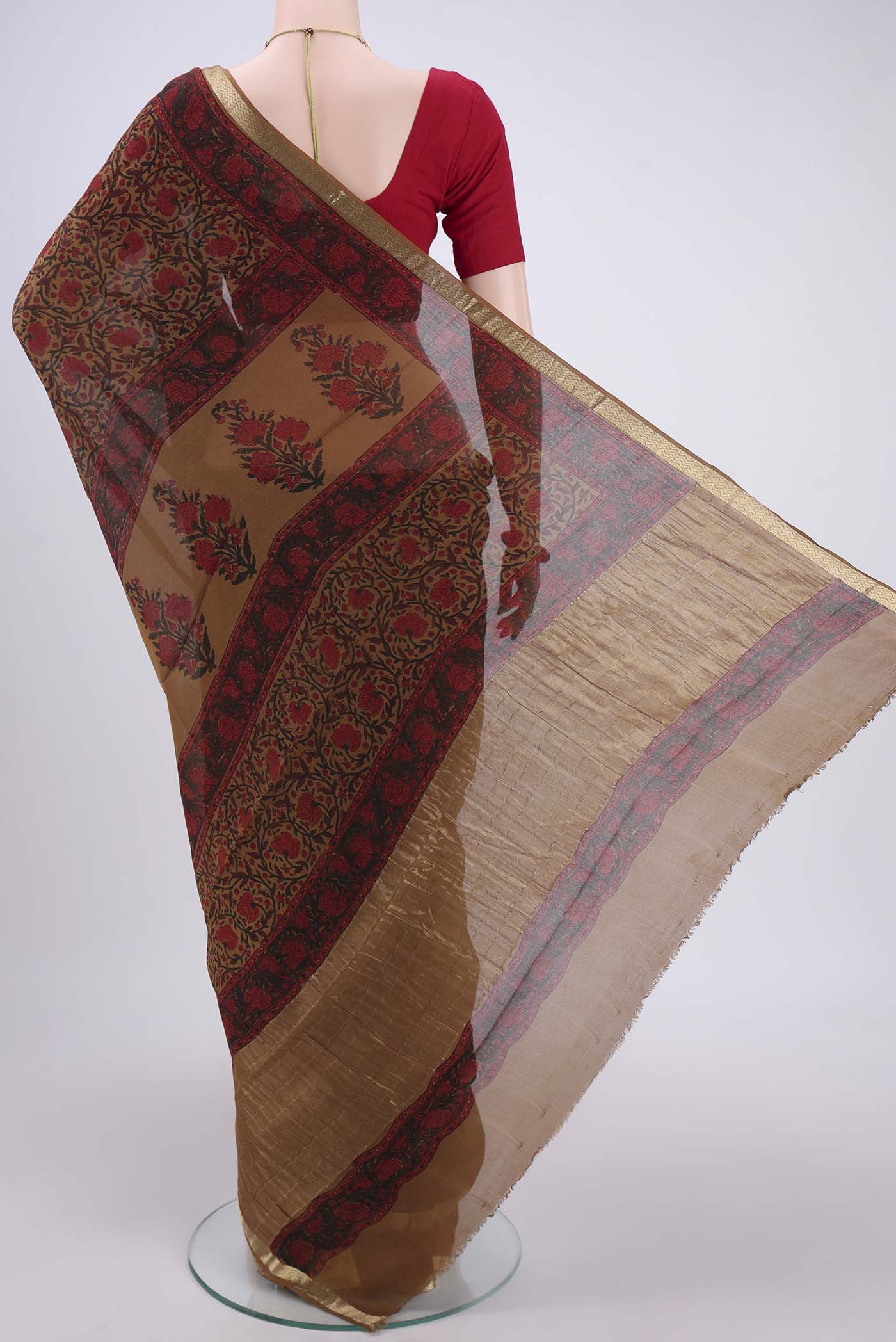 Flat view of Mustard Mysore Crepe Saree with Floral Print on the body and Zari Border. 
