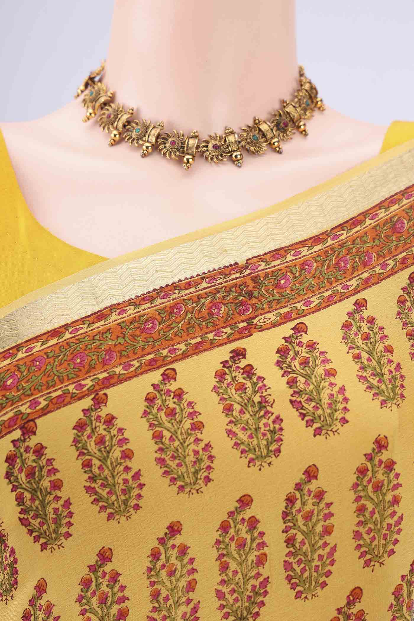 Border image of Yellow Mysore Crepe Saree with Floral Print on the body and Zari Border. 