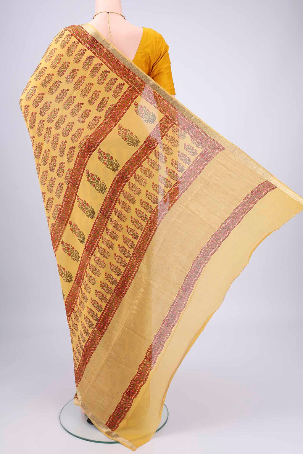 Flat view of Yellow Mysore Crepe Saree with Floral Print on the body and Zari Border. 