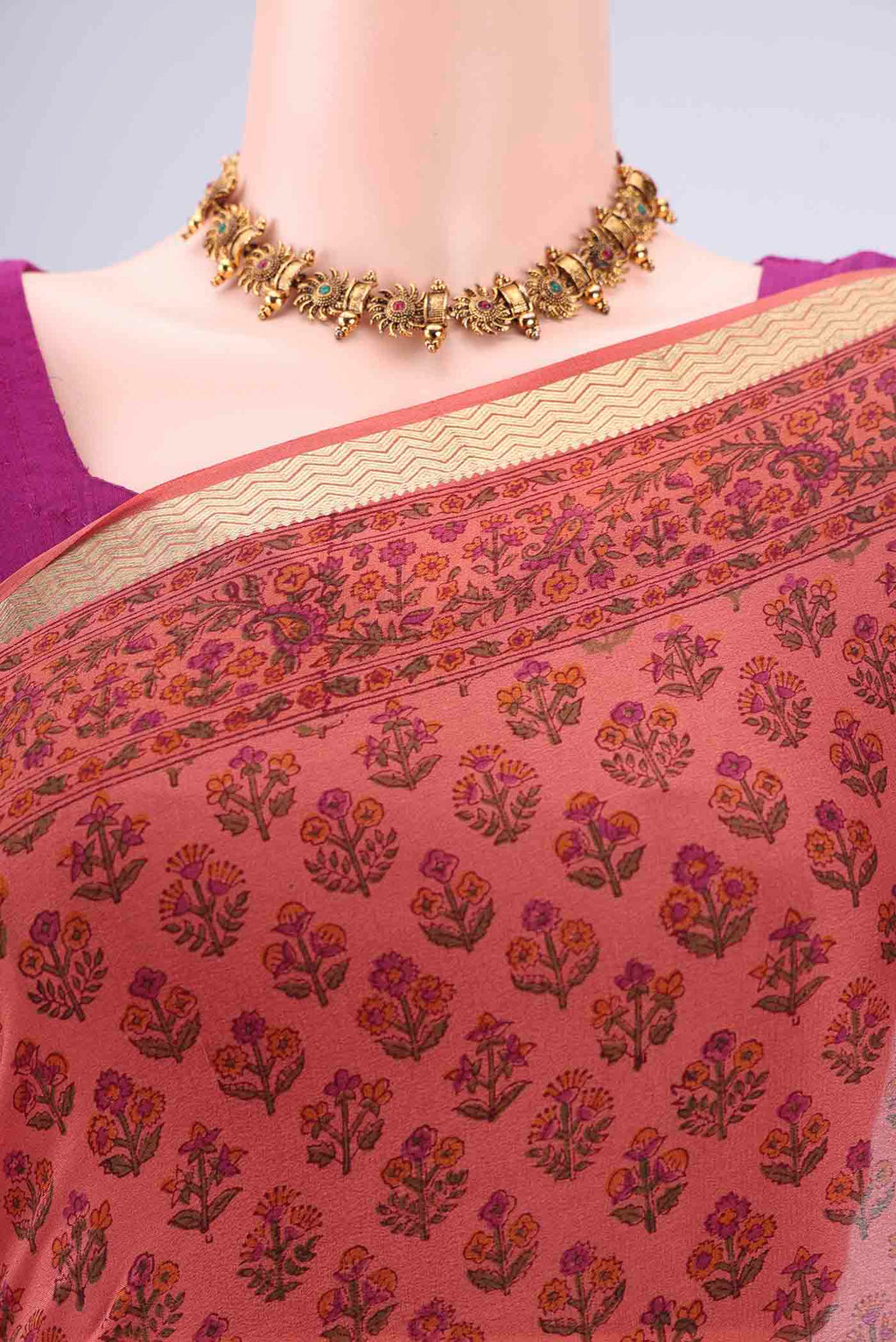 Border image of Coral Mysore Crepe Saree with Floral Print on the body and Zari Border. 